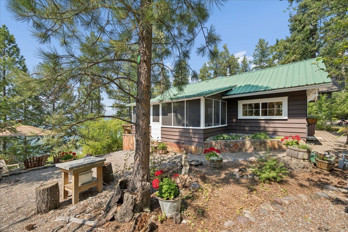332 Flathead Lodge Road, Bigfork, MT 59911 South side of cabin with area for outdoor entertaining