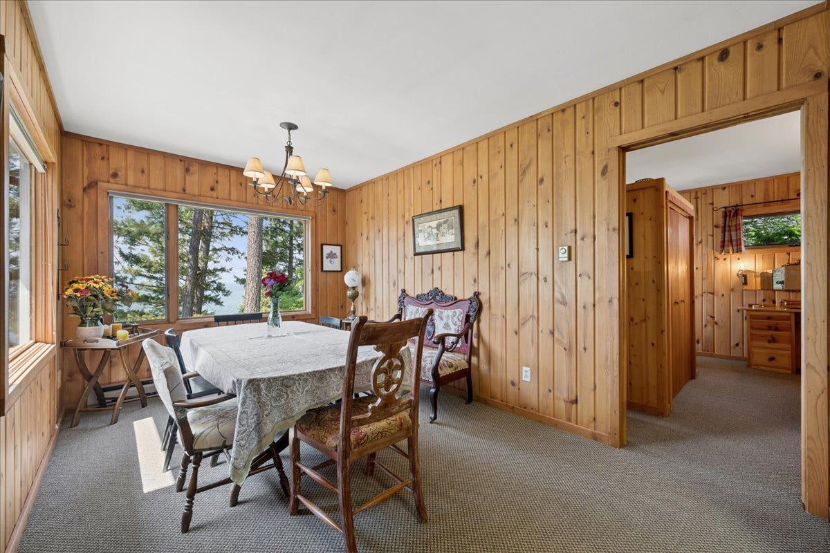 332 Flathead Lodge Road, Bigfork, MT 59911 Dining room with amazing views of Flathead Lake! Master bedroom off to the right
