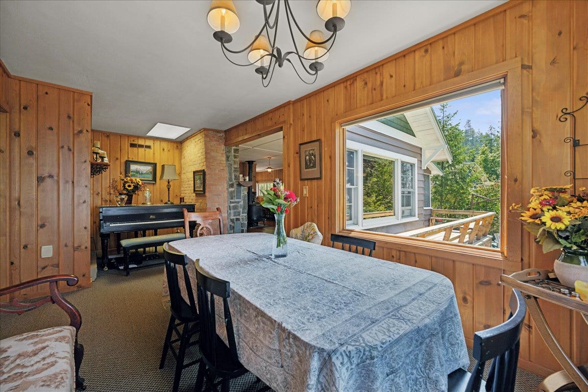 332 Flathead Lodge Road, Bigfork, MT 59911 Dining room looking back towards living room