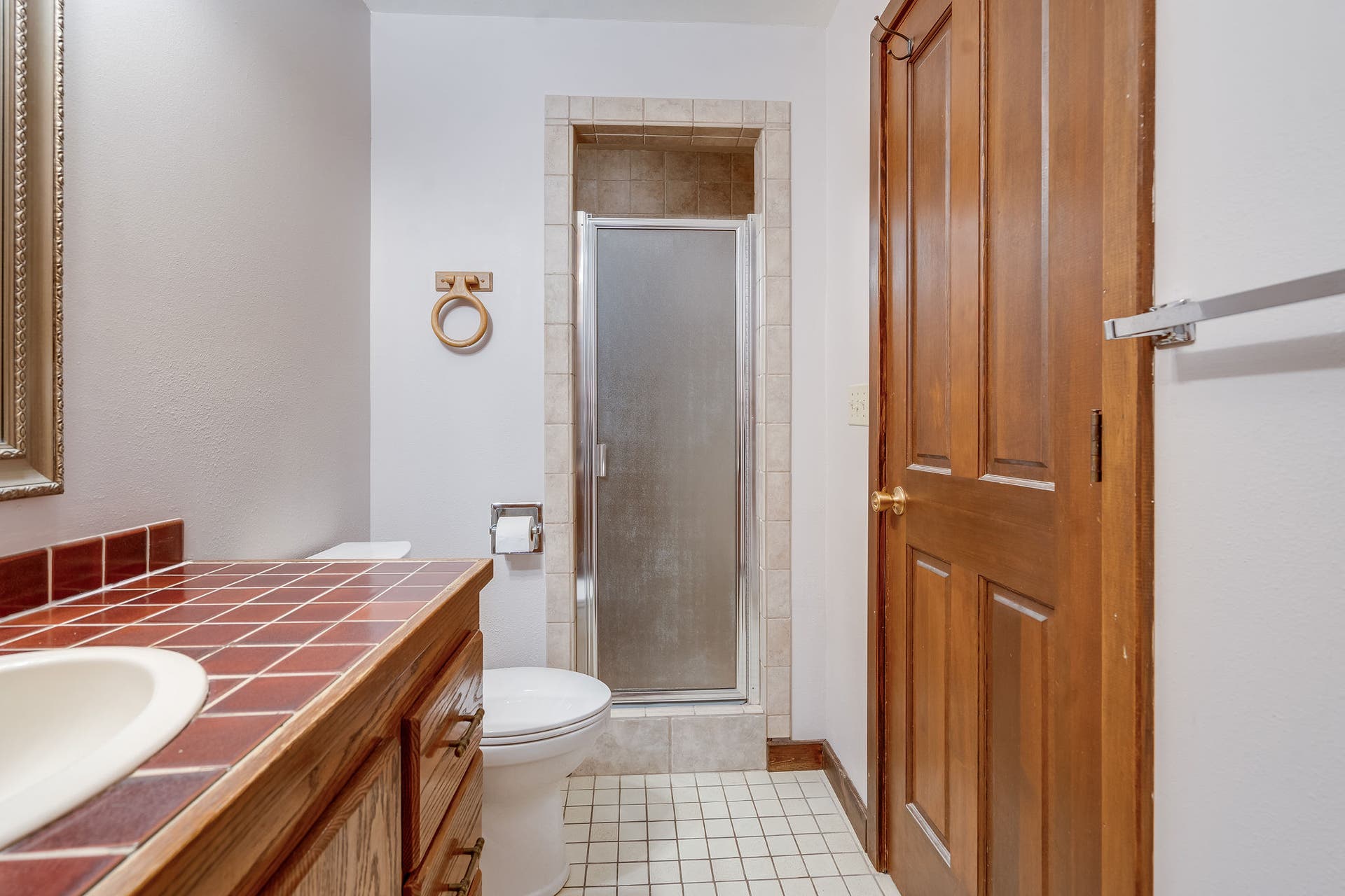 244 Bench Drive, Kalispell, MT 59901 Full bathroom with functional vanity layout.