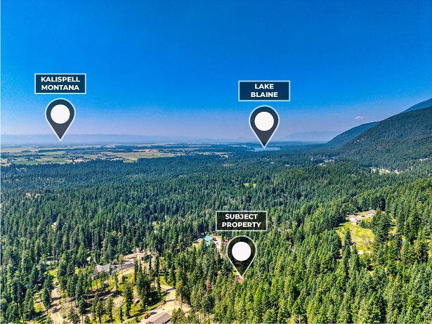 244 Bench Drive, Kalispell, MT 59901 Aerial drone shot of 244 Bench Run home on 3 acres near Flathead Lake and Bigfork MT. Wooded privacy just minutes from Flathead Lake, Bigfork, and world-class hiking in the Jewel Basin.