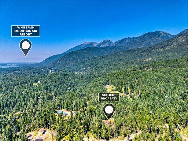 244 Bench Drive, Kalispell, MT 59901 Aerial drone shot of 244 Bench Run home on 3 acres near Flathead Lake and Bigfork MT. Wooded privacy just minutes from Flathead Lake, Bigfork, and world-class hiking in the Jewel Basin.
