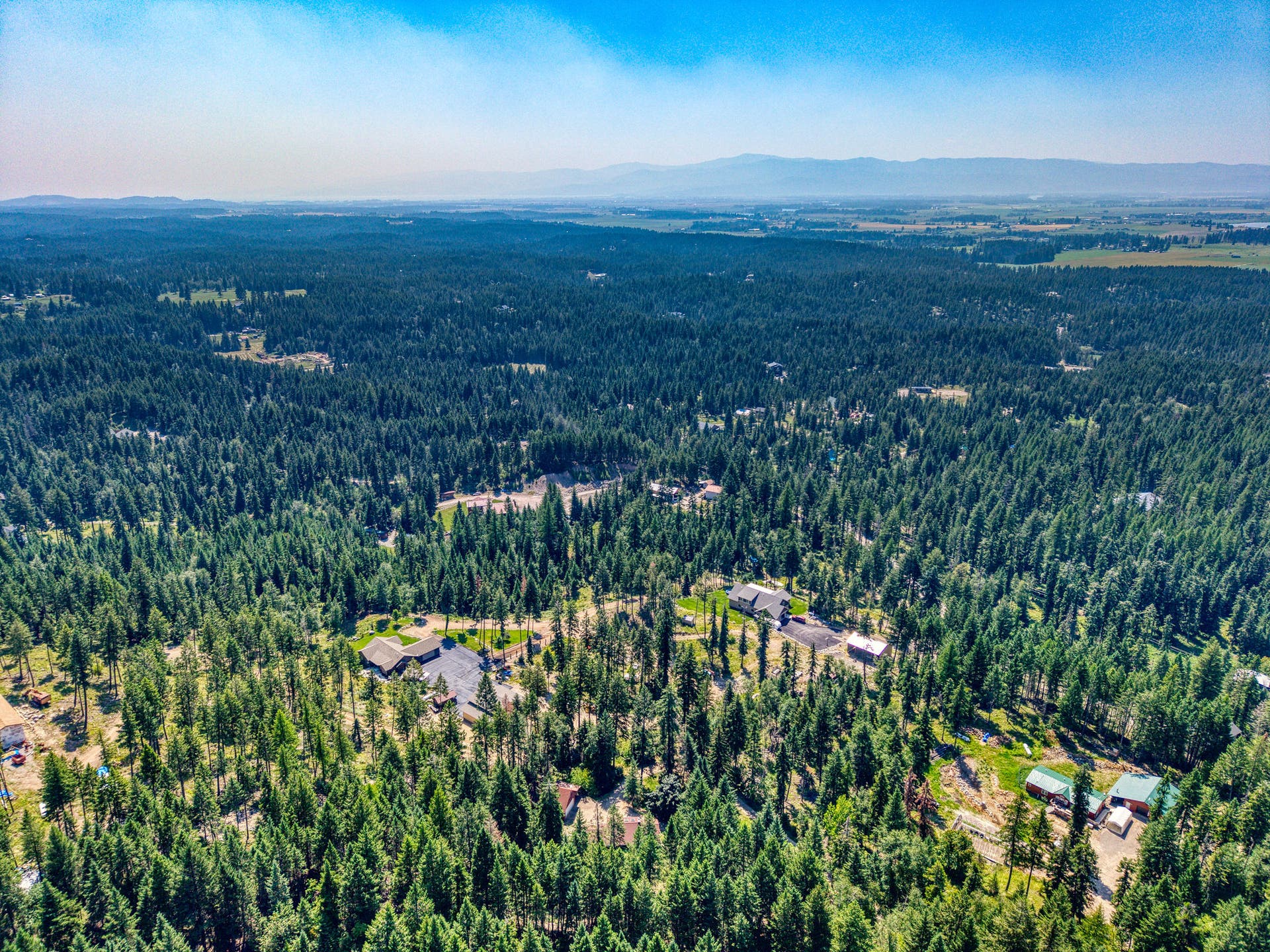 244 Bench Drive, Kalispell, MT 59901 Aerial drone shot of 244 Bench Run home on 3 acres near Flathead Lake and Bigfork MT. Wooded privacy just minutes from Flathead Lake, Bigfork, and world-class hiking in the Jewel Basin.