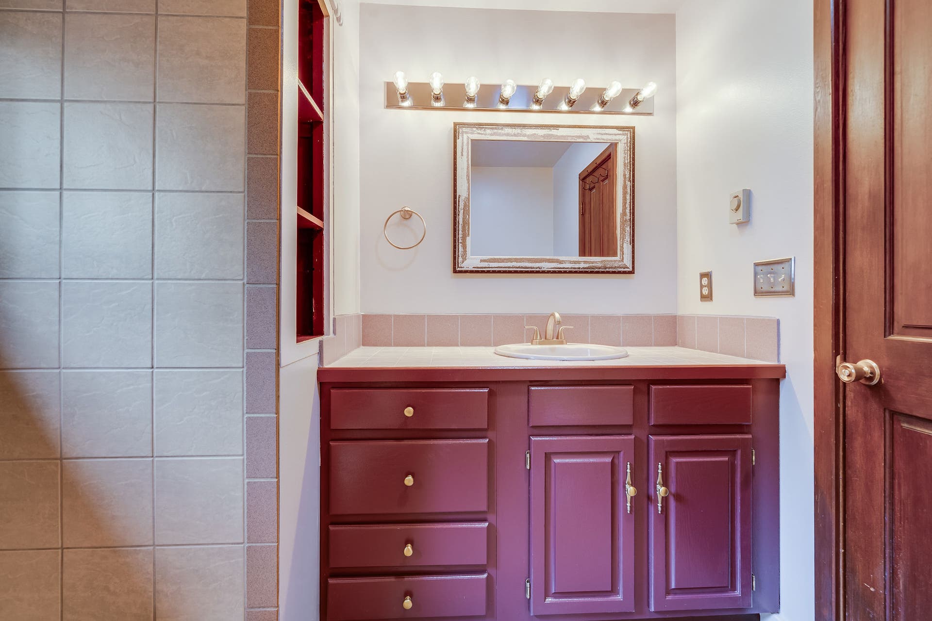 244 Bench Drive, Kalispell, MT 59901 Full bathroom with functional vanity layout.