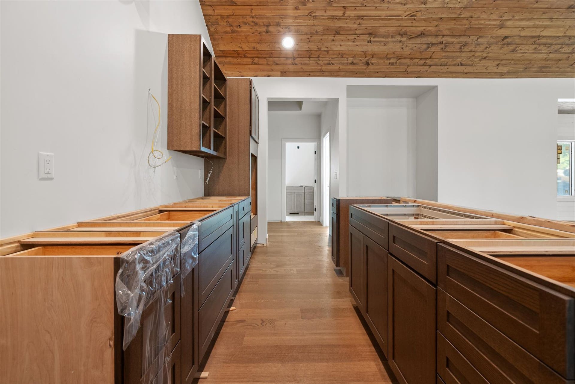 33542 Westview Drive, Bigfork, MT 59911 Open kitchen displaying soft-close cabinet bases and a center island layout