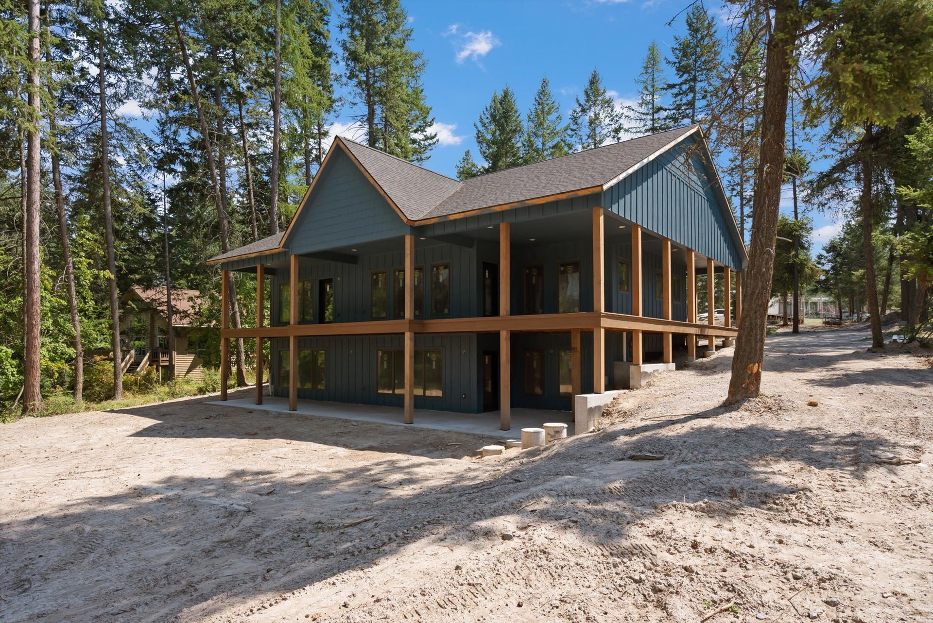 33542 Westview Drive, Bigfork, MT 59911 Rear exterior elevation highlighting the full walkout lower level