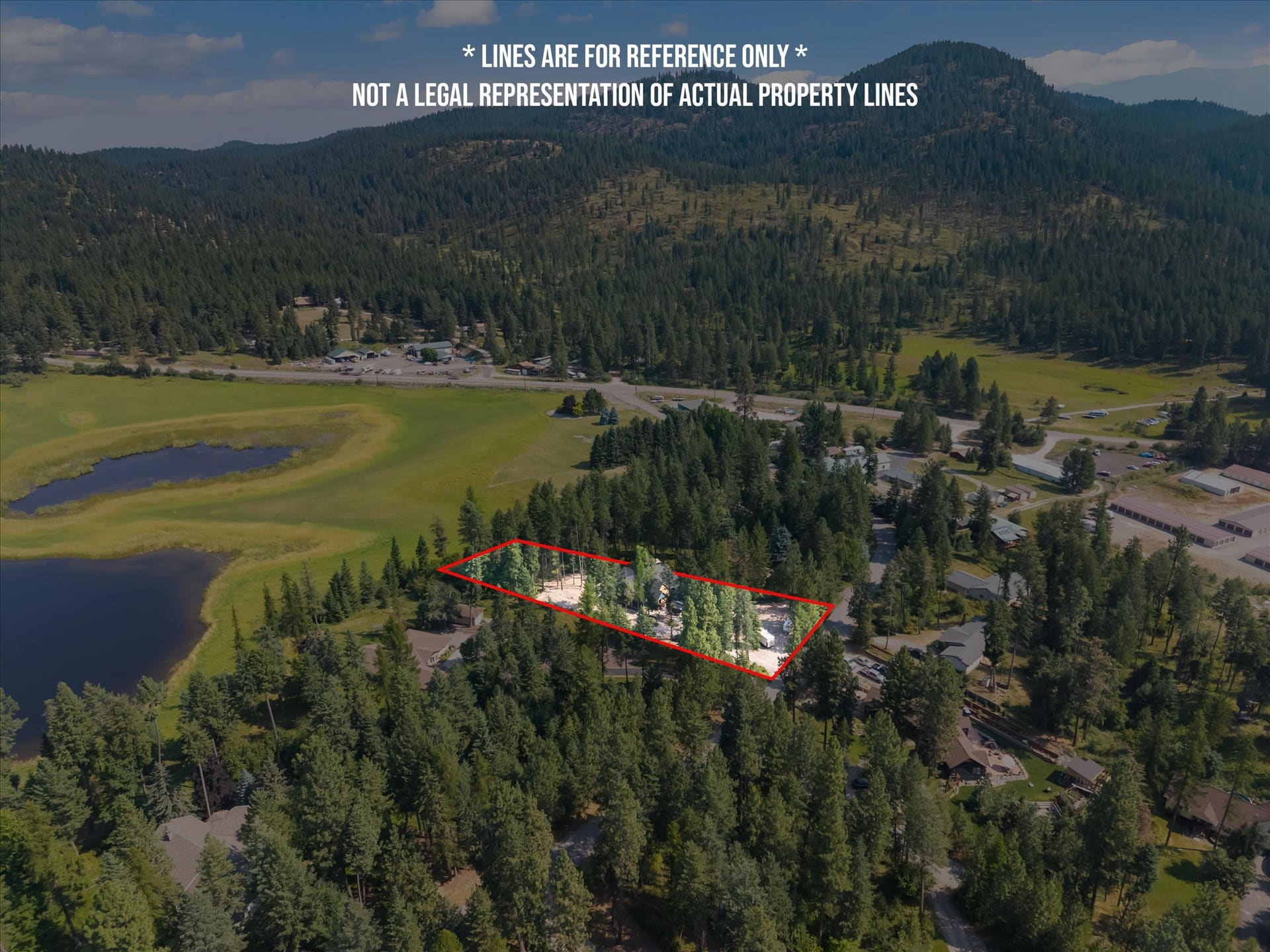 33542 Westview Drive, Bigfork, MT 59911 Aerial view outlining the private 1.26-acre property boundaries adjacent to Potato Lake