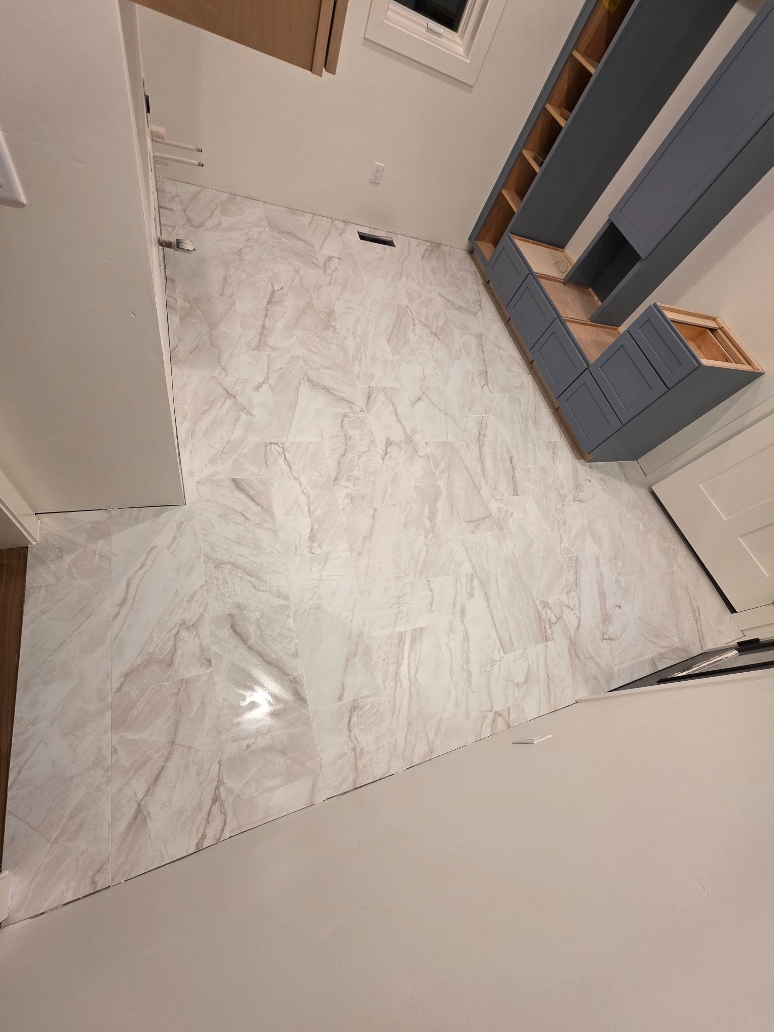 33542 Westview Drive, Bigfork, MT 59911 Tile flooring completed in the main-level laundry