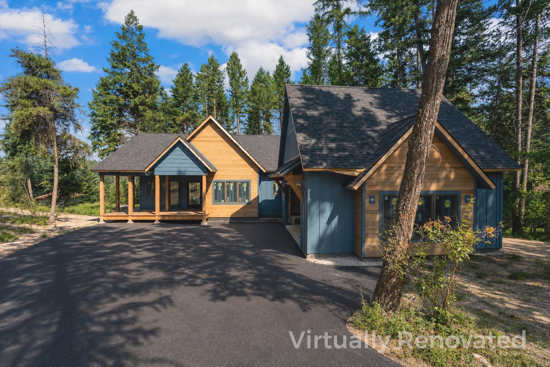 33542 Westview Drive, Bigfork, MT 59911 Front exterior elevation highlighting modern mountain architectural accents (Driveway virtually staged)