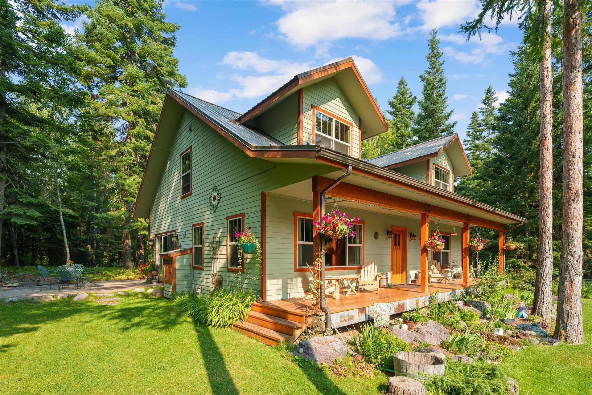 13786 Ridge Loop Road, Bigfork, MT 59911 Front covered porch, Side brick patio, Pass through firewood storage
