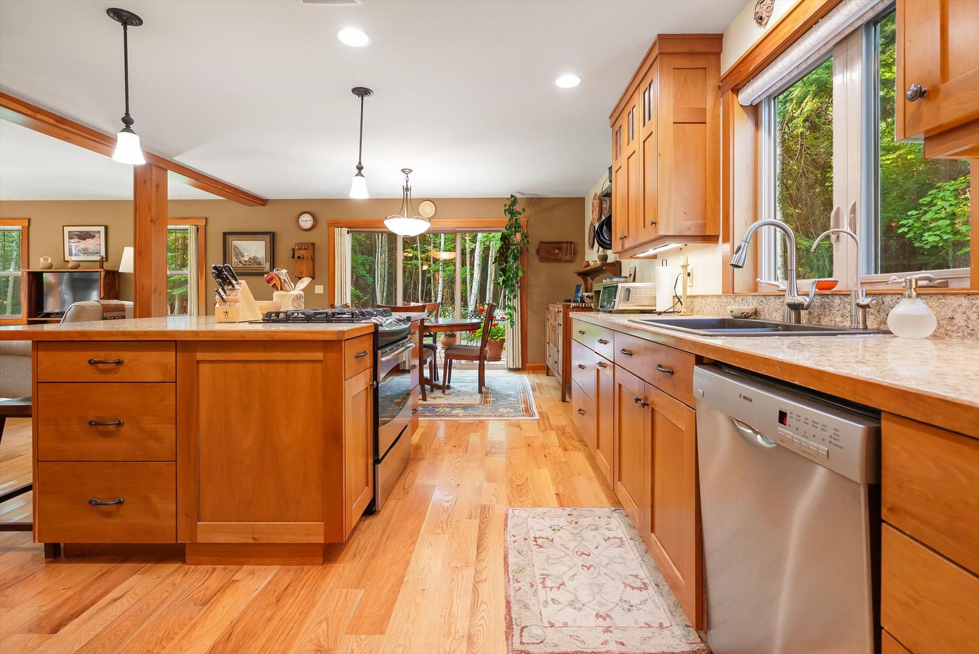 13786 Ridge Loop Road, Bigfork, MT 59911 Kitchen w/ custom cherry cabinetry and Velux Sun Tunnel