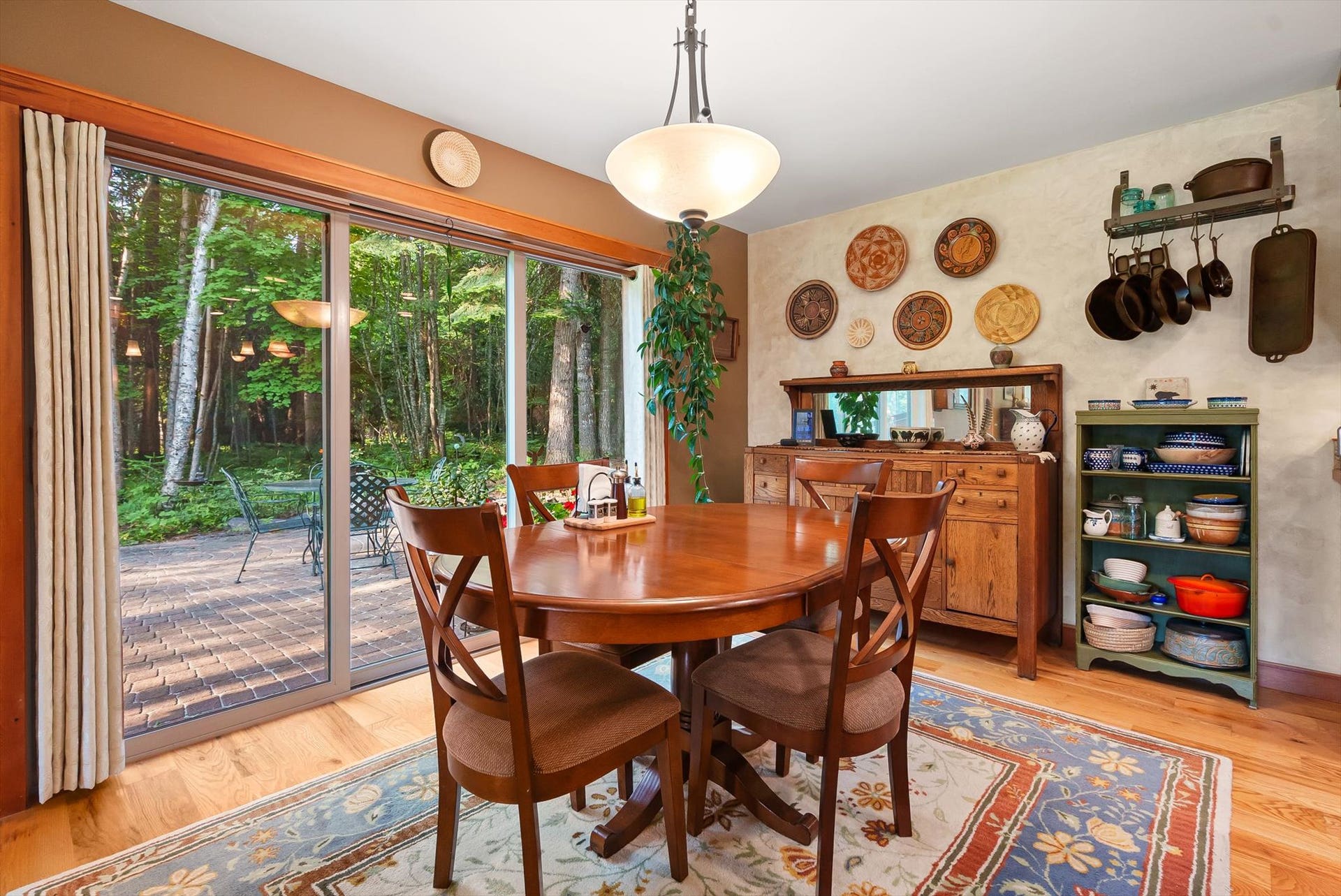 13786 Ridge Loop Road, Bigfork, MT 59911 Dining area w/ sliding glass door to the brick patio