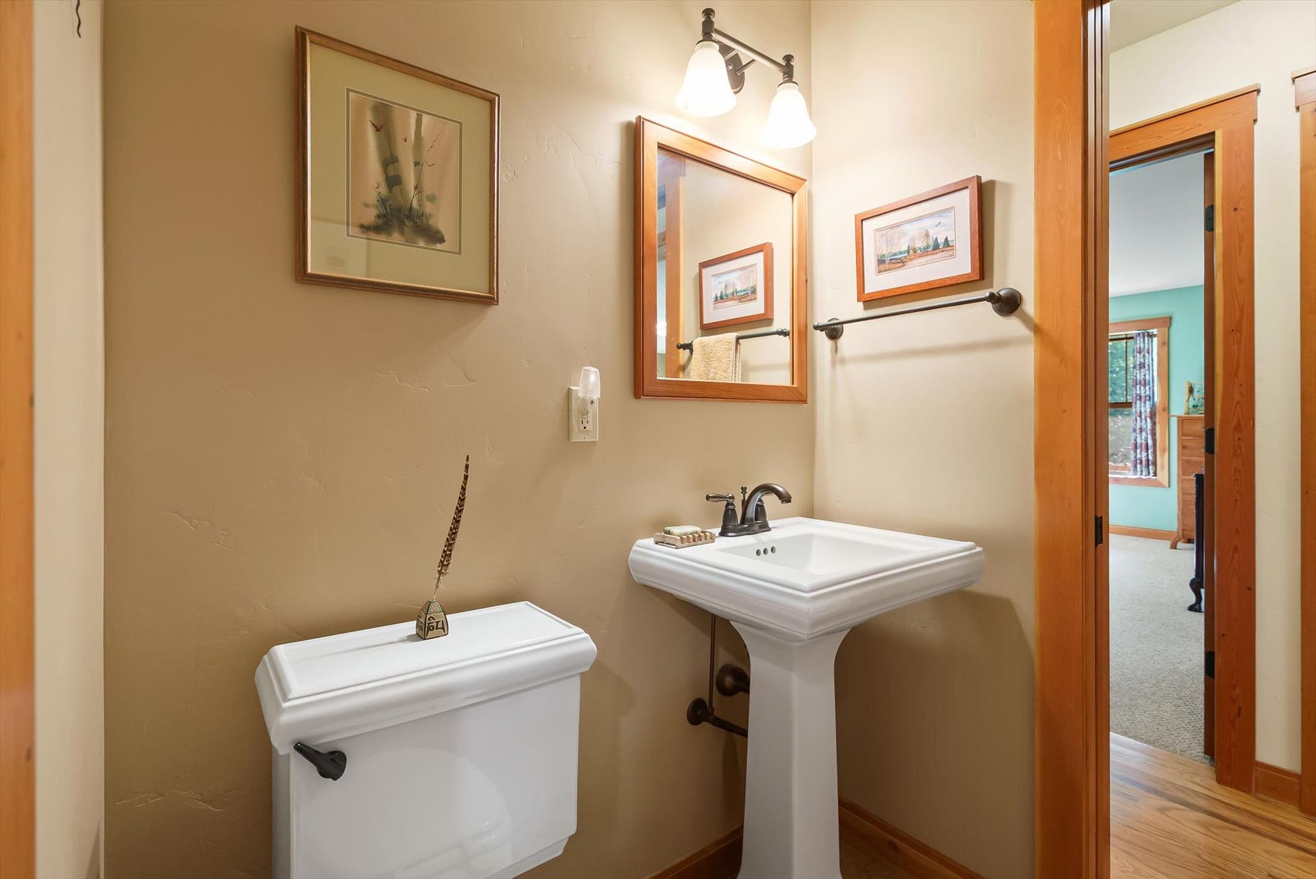 13786 Ridge Loop Road, Bigfork, MT 59911 1/2 bath w/ dual access from the hallway and laundry room