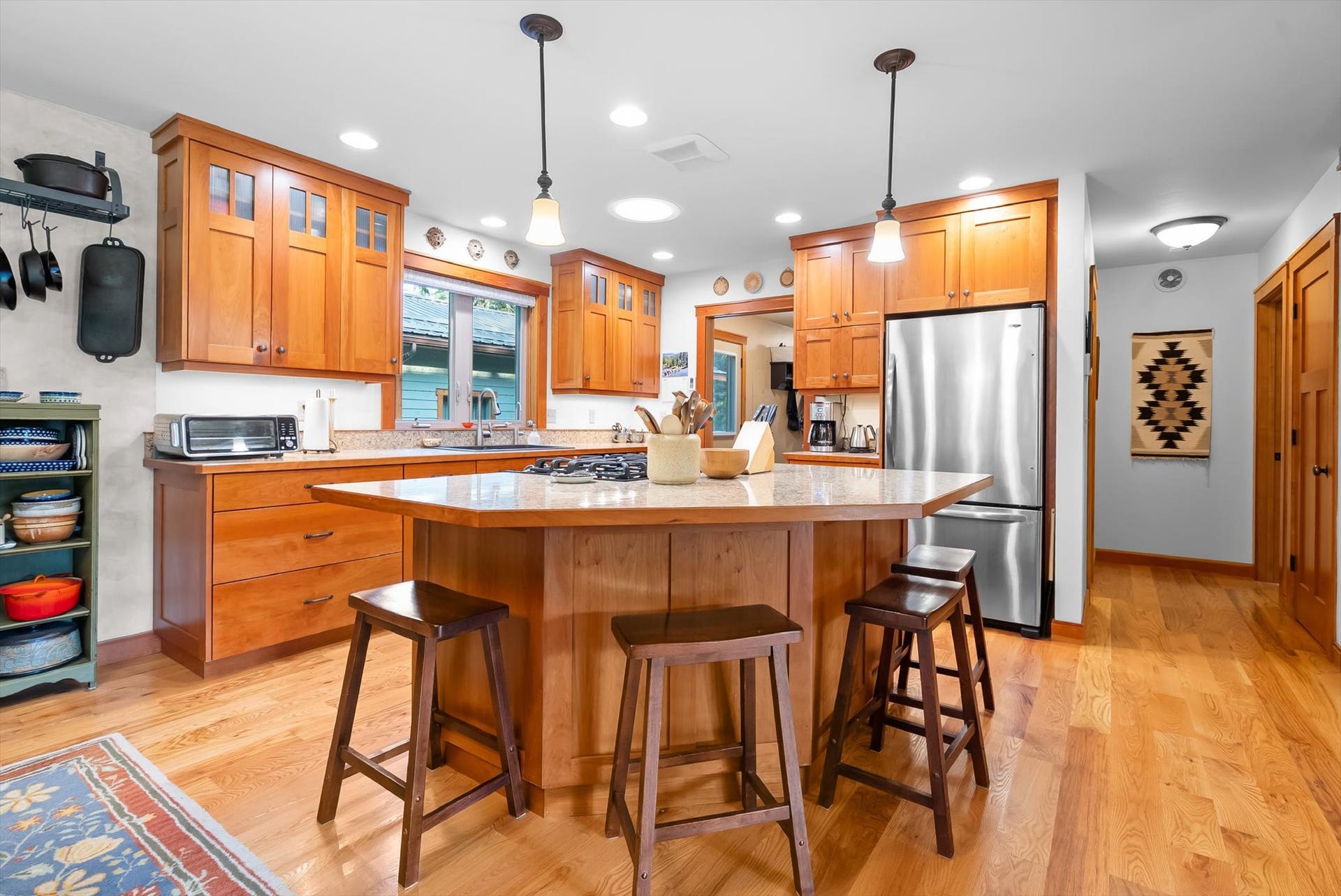 13786 Ridge Loop Road, Bigfork, MT 59911 Kitchen w/ custom cherry cabinetry and Velux Sun Tunnel