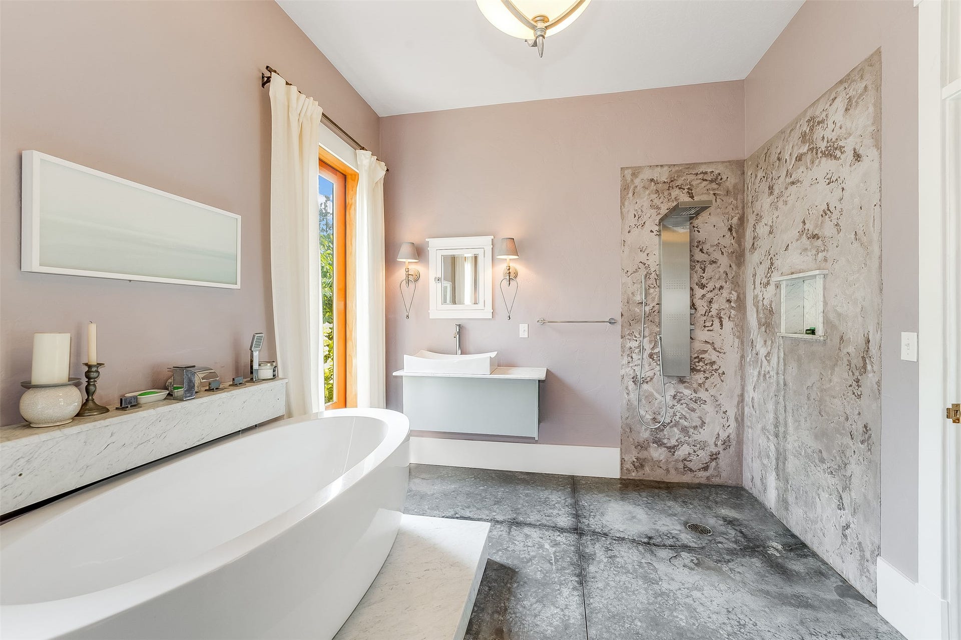 21848 Mt Highway 35, Bigfork, MT 59911 Freestanding soaking tub with a stone surround in Guest Bath.