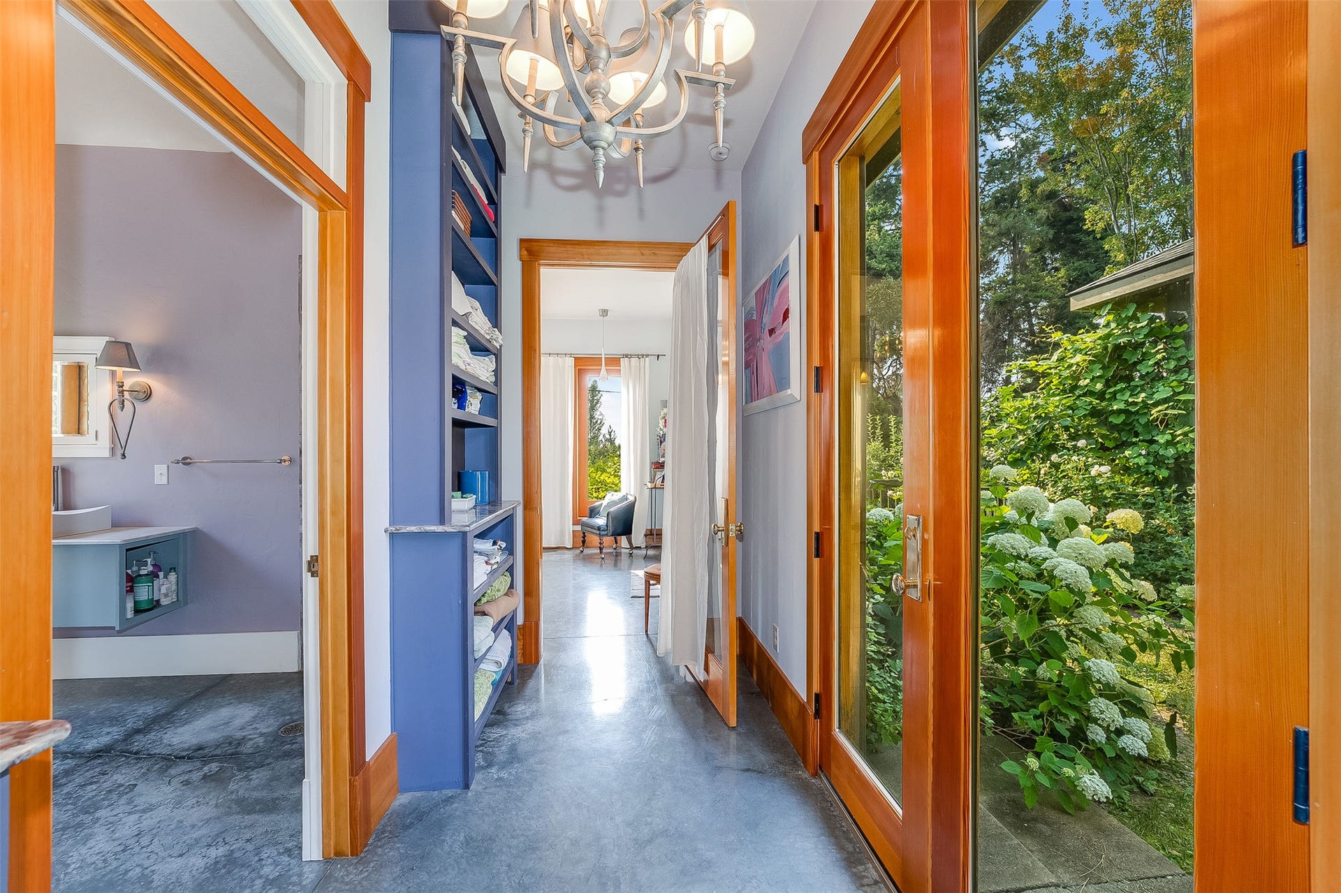 21848 Mt Highway 35, Bigfork, MT 59911 Hallway in Guest Wing with courtyard access on right.