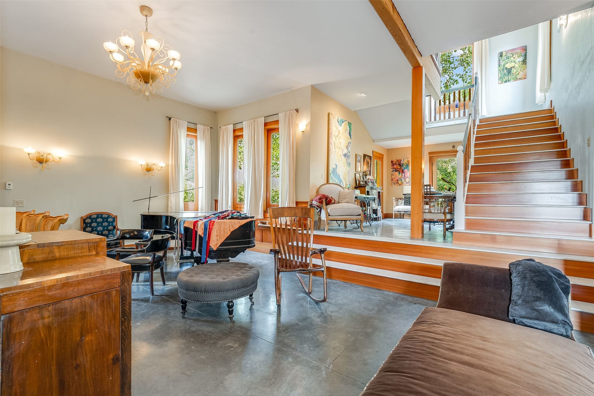 21848 Mt Highway 35, Bigfork, MT 59911 Multi-level interior featuring a grand wood staircase with white marble steps.