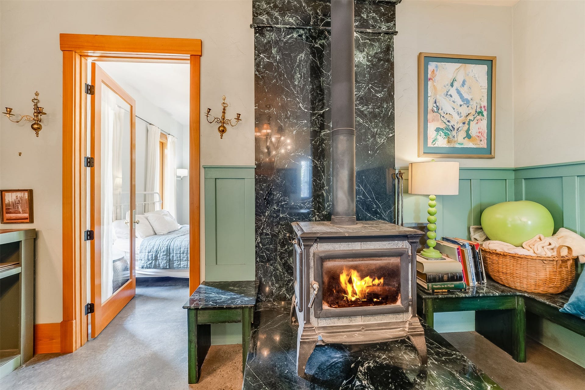 21848 Mt Highway 35, Bigfork, MT 59911 A warm fire provides cozy comfort in the library on chilly evenings.