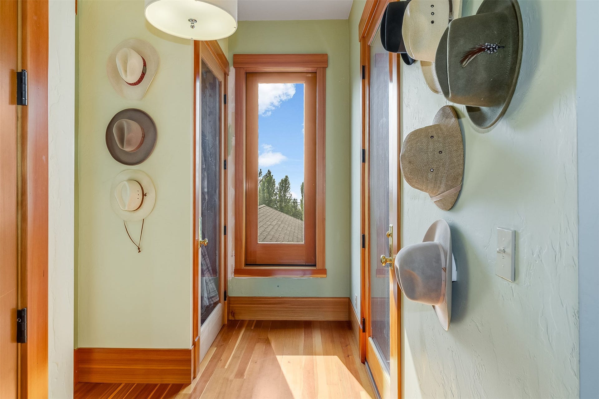 21848 Mt Highway 35, Bigfork, MT 59911 Hardwood flooring with natural wood trim and doors