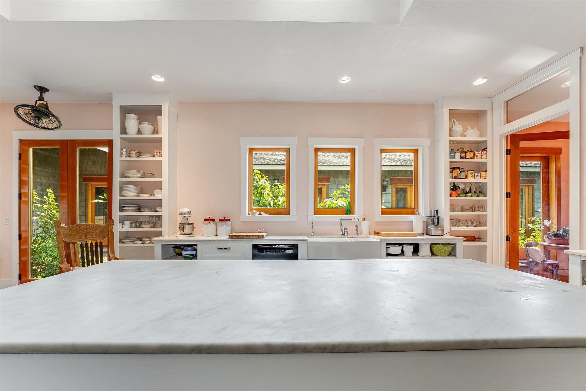 21848 Mt Highway 35, Bigfork, MT 59911 Italian Carrara marble island work table in center of the kitchen.