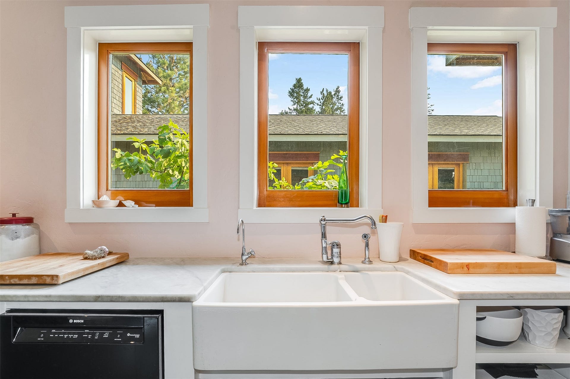 21848 Mt Highway 35, Bigfork, MT 59911 Dishwasher and fire clay sink. Carrara marble countertops.