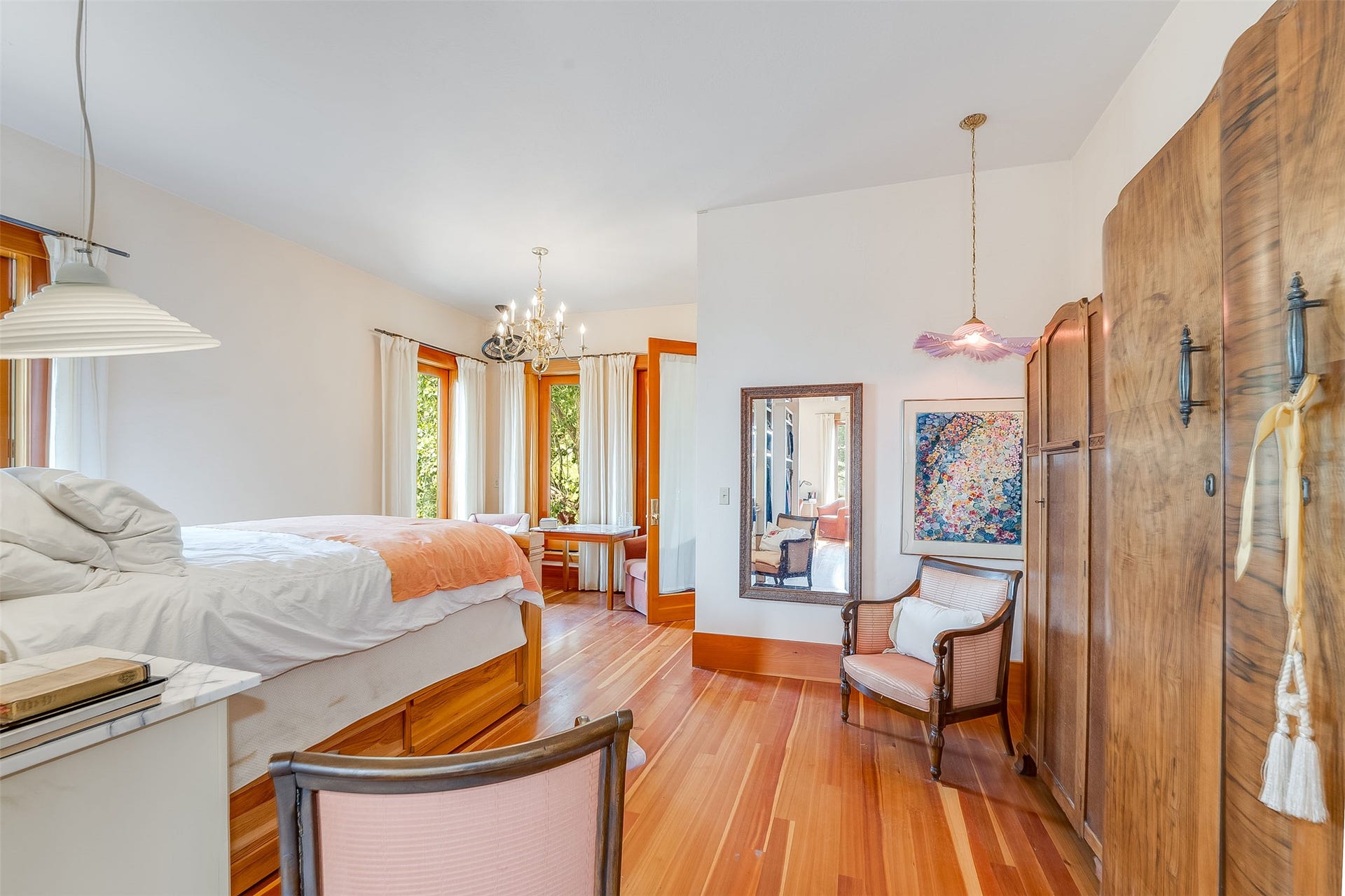 21848 Mt Highway 35, Bigfork, MT 59911 Hardwood flooring throughout featuring white walls and ample natural light