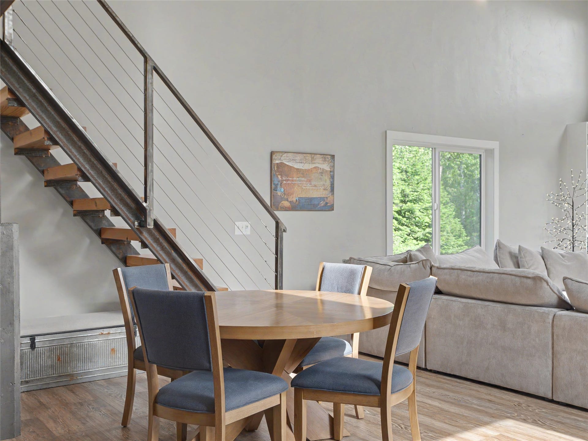 28012 Meadow Creek Road, Bigfork, MT 59911 Open-tread staircase with metal framework and cable railing system leading to loft