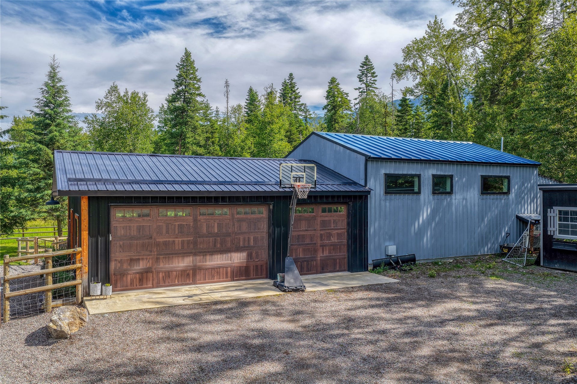 28012 Meadow Creek Road, Bigfork, MT 59911 Three car garage and guest quarters.