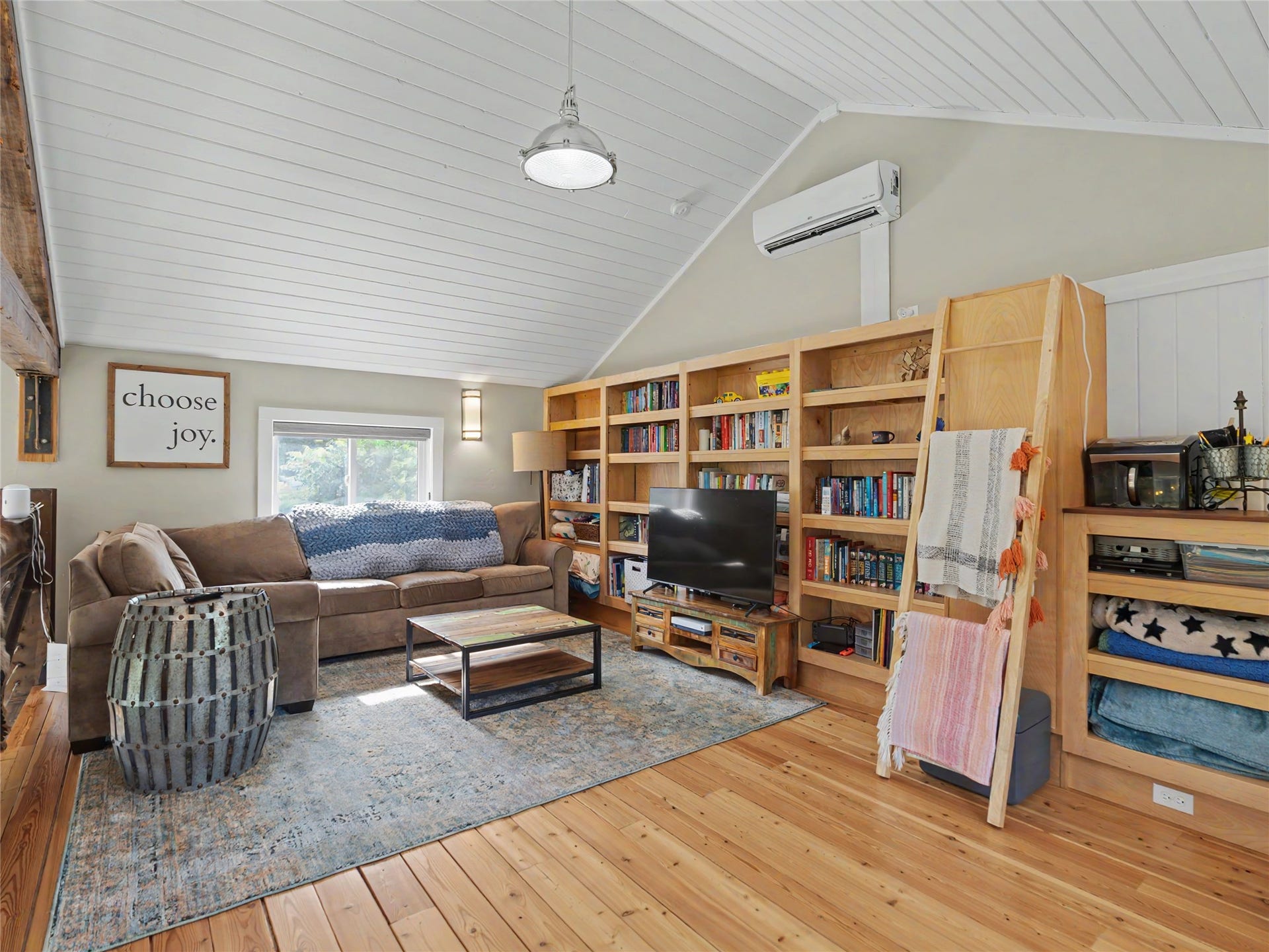 28012 Meadow Creek Road, Bigfork, MT 59911 Vaulted shiplap ceiling over wood-finish flooring