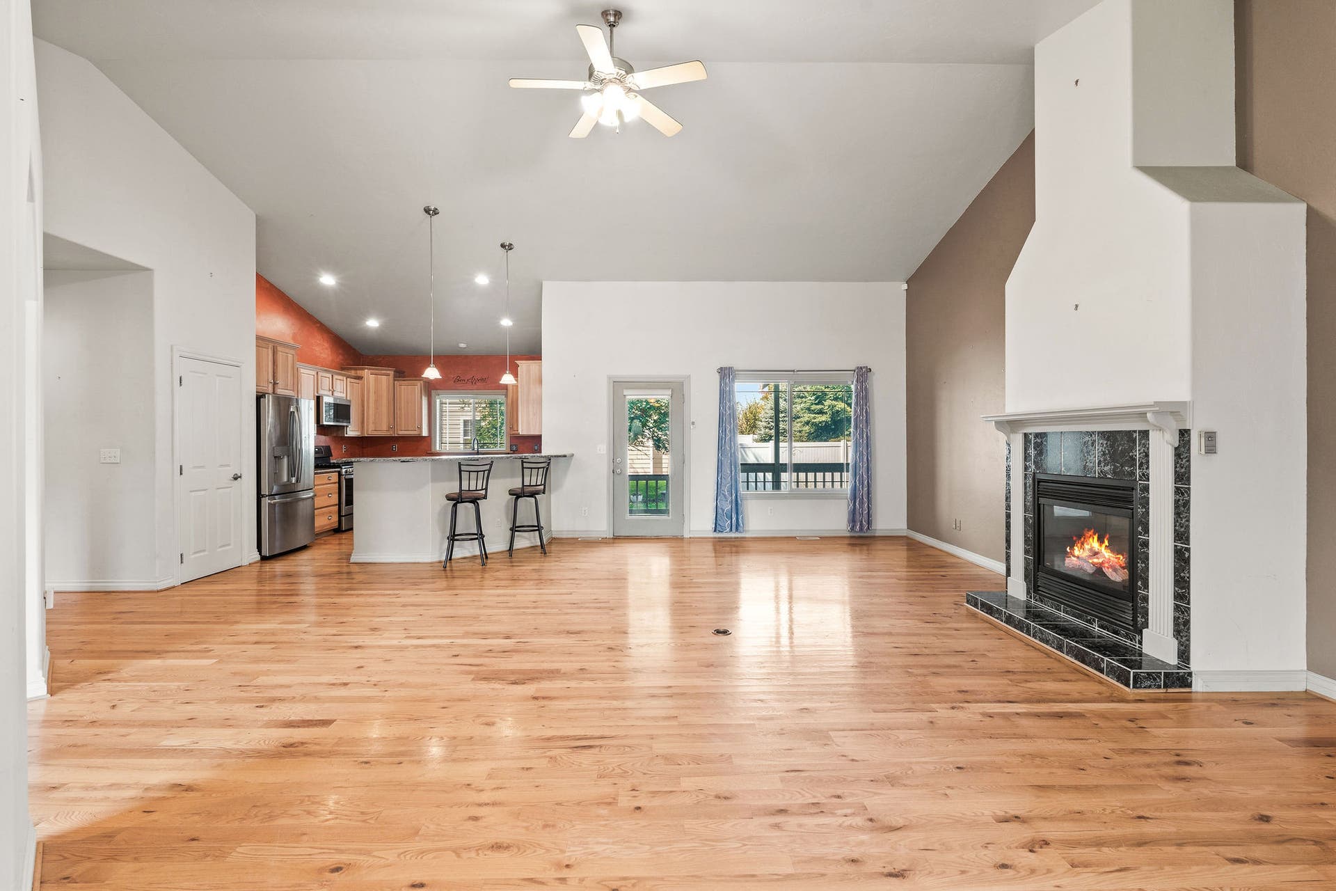 214 O'Brien Terrace N, Bigfork, MT 59911 Exterior access to the rear deck with glass storm door