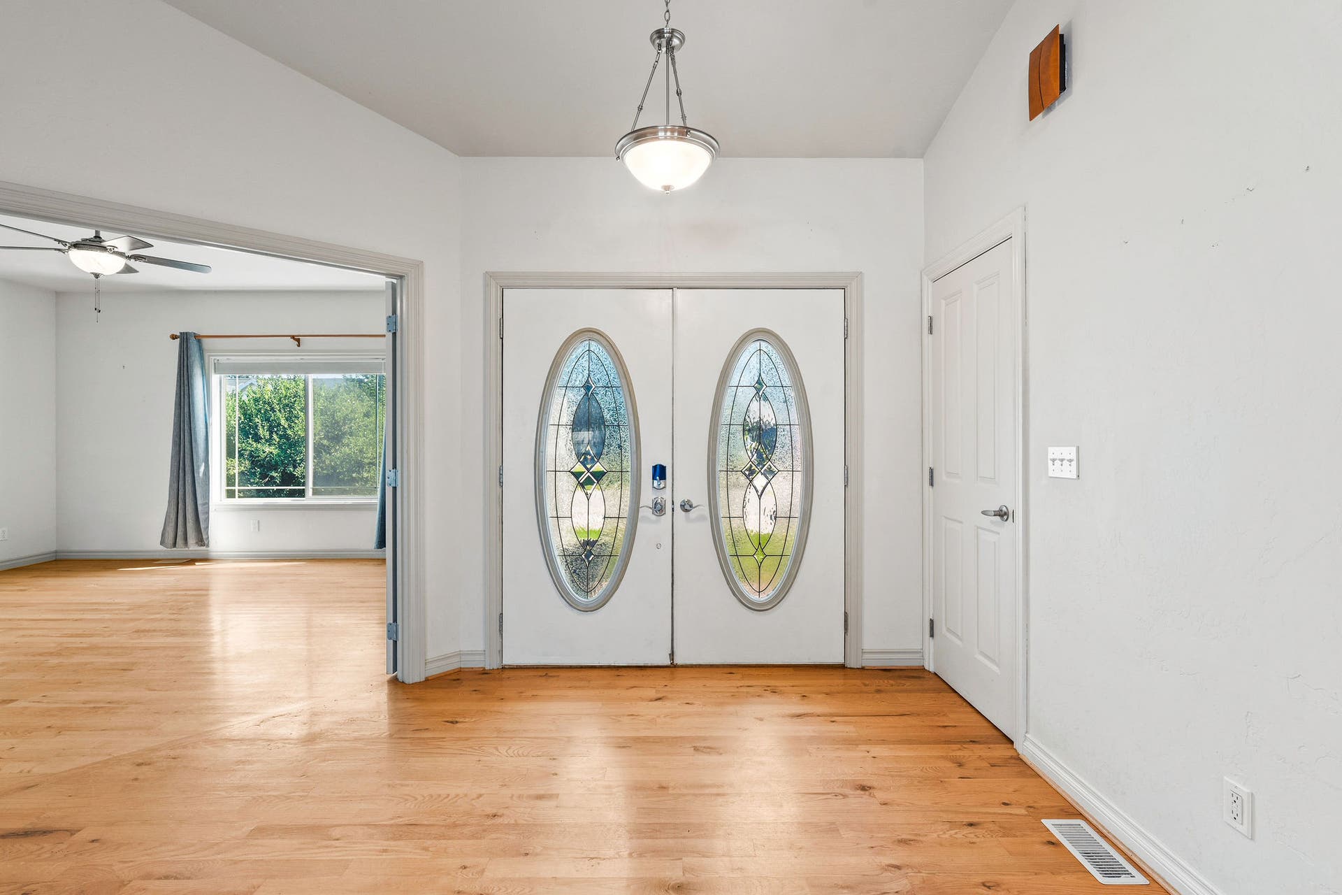 214 O'Brien Terrace N, Bigfork, MT 59911 Double oak entry doors with leaded glass inserts