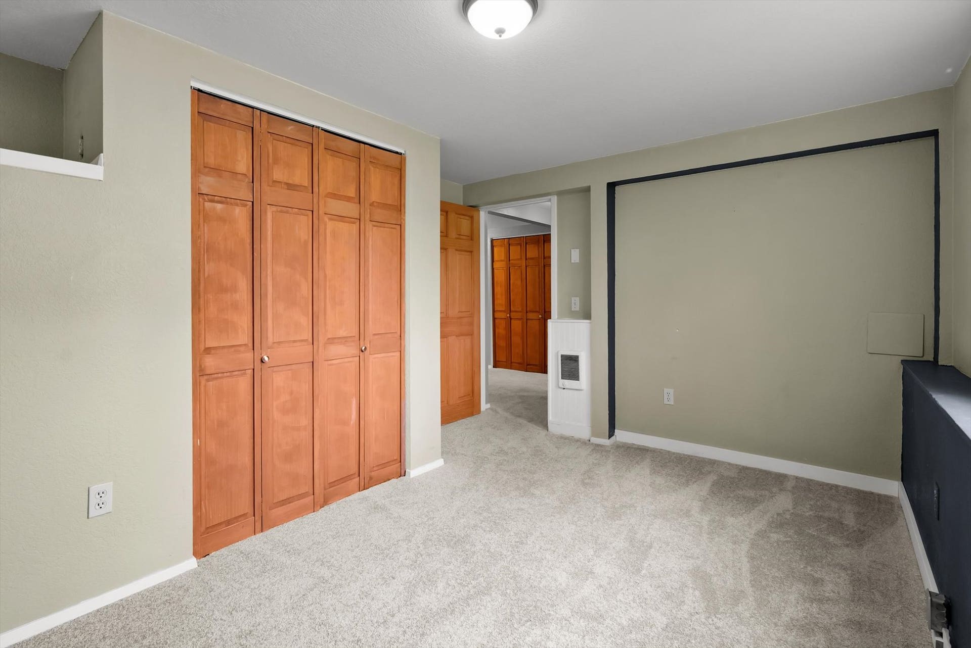 300 Peaceful Drive, Bigfork, MT 59911 Light-toned carpet flooring with neutral wall paint