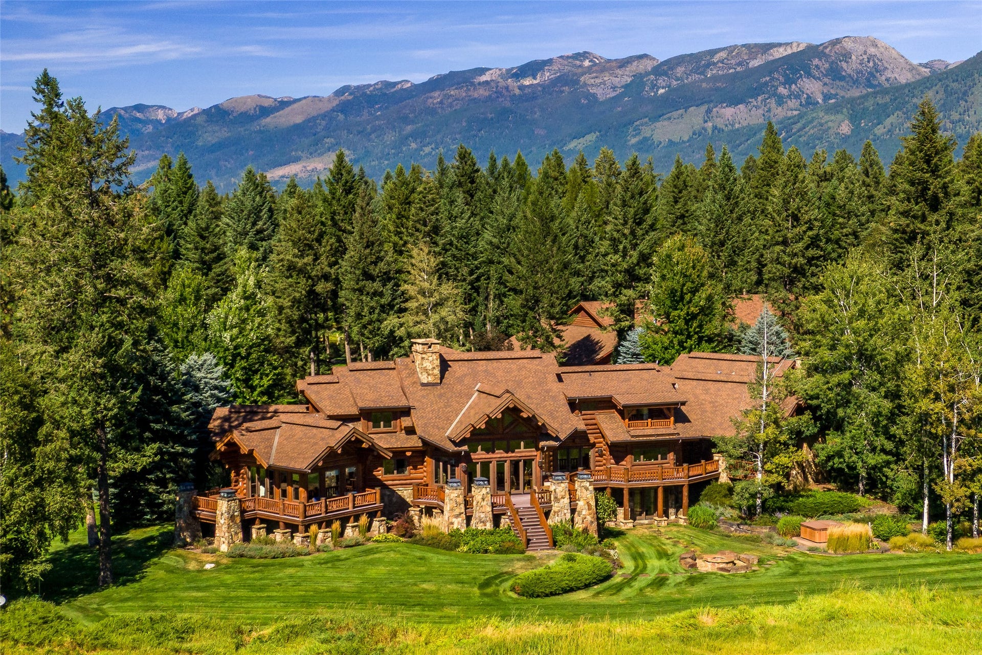 12890 Carney Ranch Road, Bigfork, MT 59911 The rear elevation with the Swan Mountains to the northeast