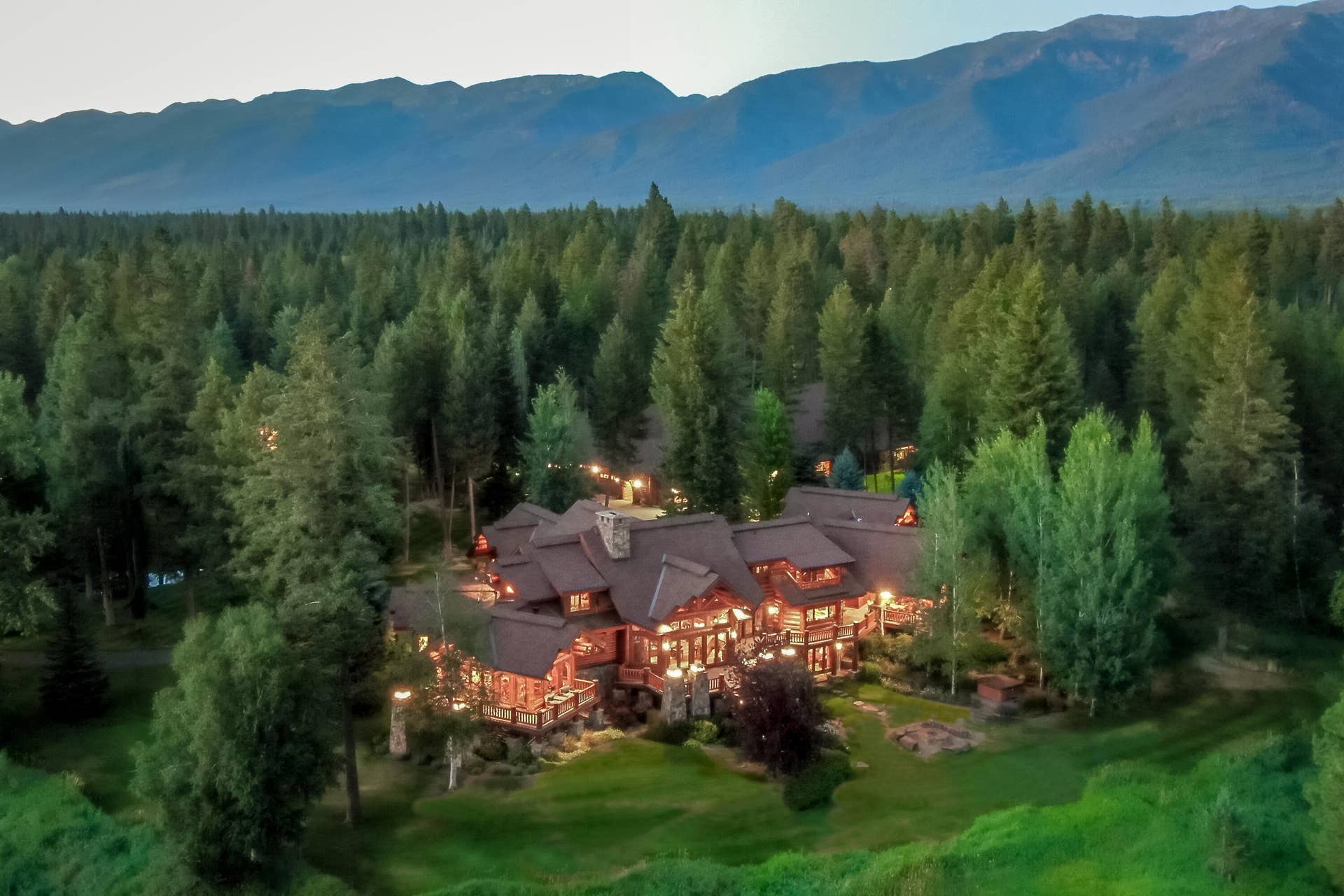 12890 Carney Ranch Road, Bigfork, MT 59911 The rear elevation at dusk