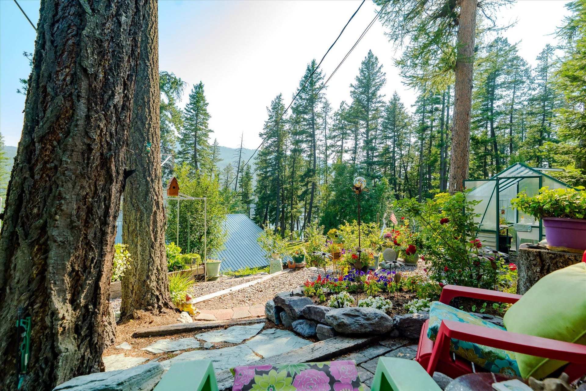 14259 Sunburst Drive, Bigfork, MT 59911 view from garden to the house and lake