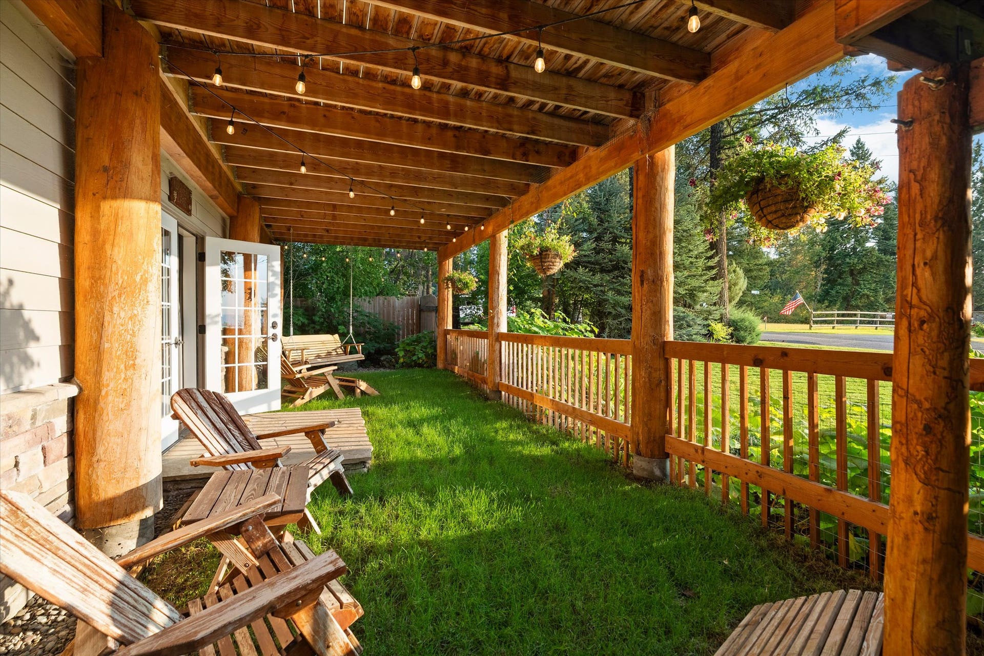 165 Sylvan Drive, Bigfork, MT 59911 Bedroom #1 - Primary - Private yard off bedroom french doors - 165 Sylvan Drive - Bigfork, MT 59911