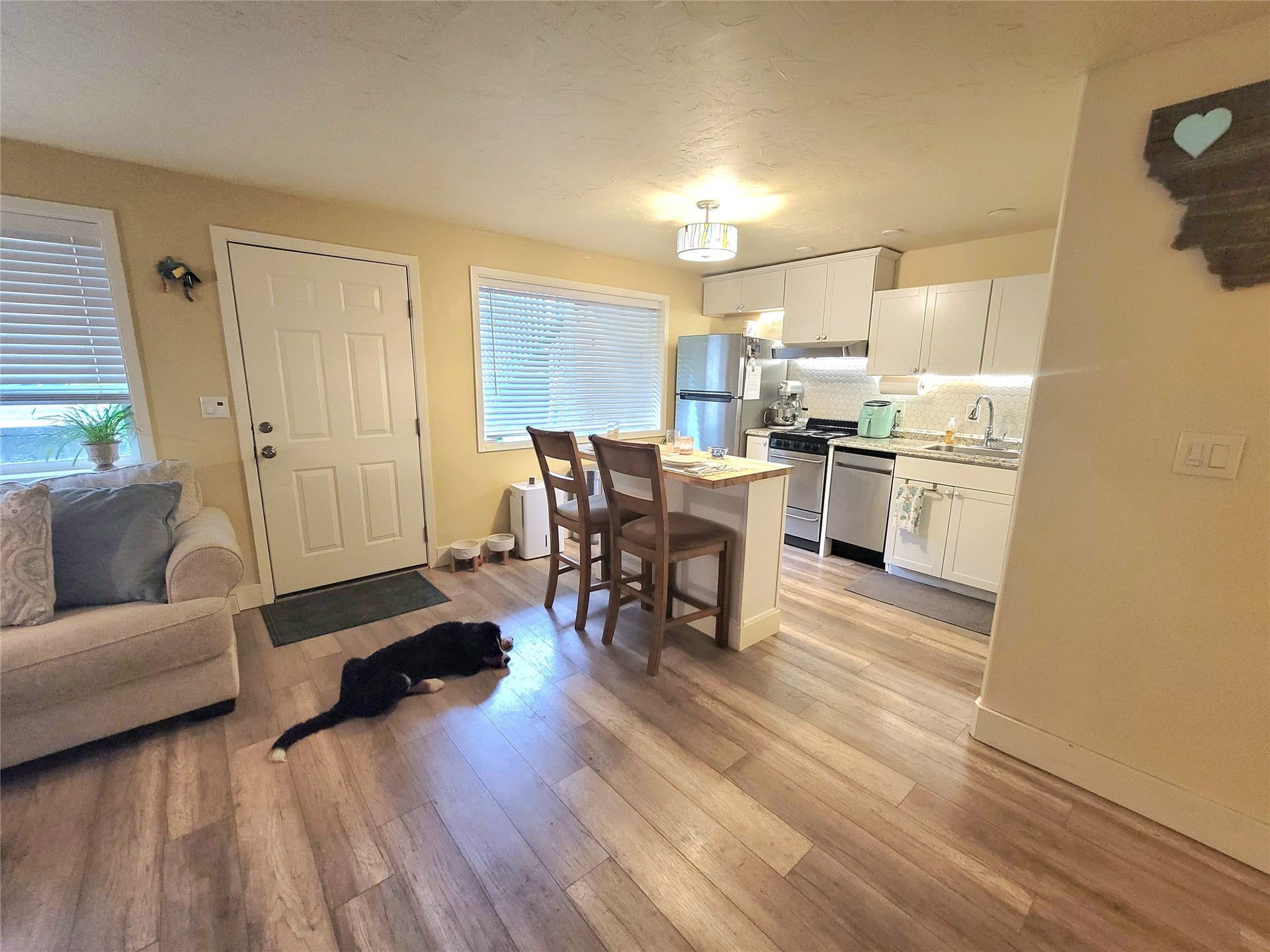8575 Mt Hwy 35, #11, Bigfork, MT 59911 looking at the kitchen and front entry door.
