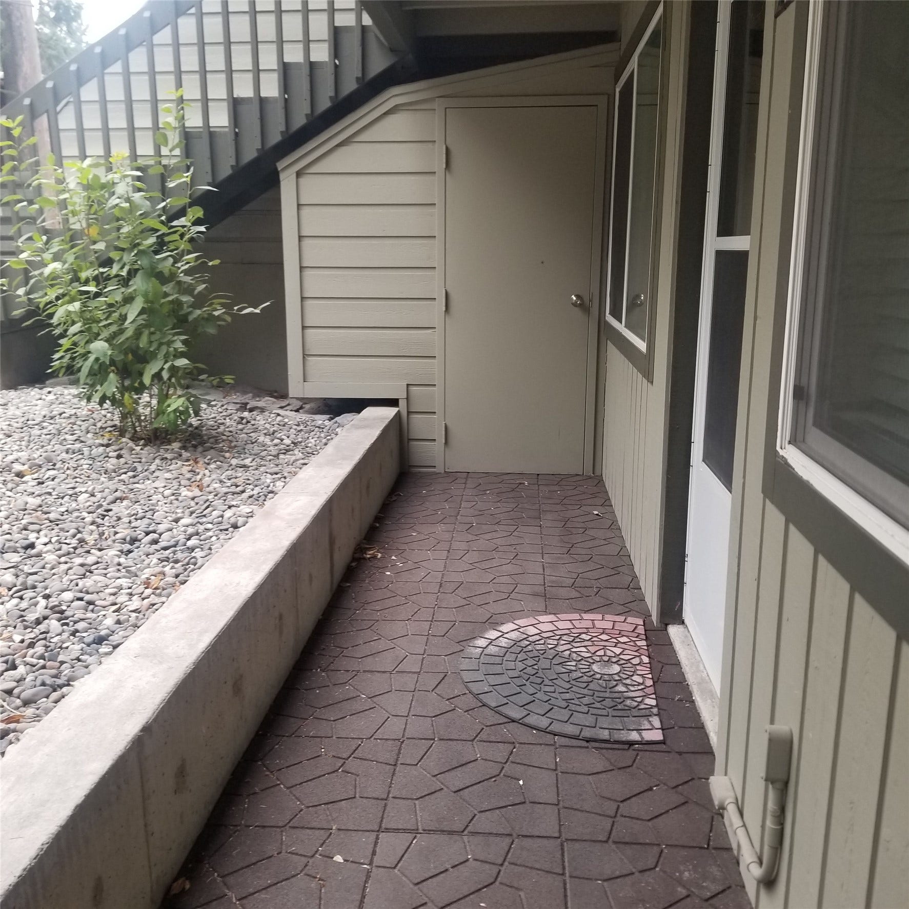 8575 Mt Hwy 35, #11, Bigfork, MT 59911 front entry area and storage porch.