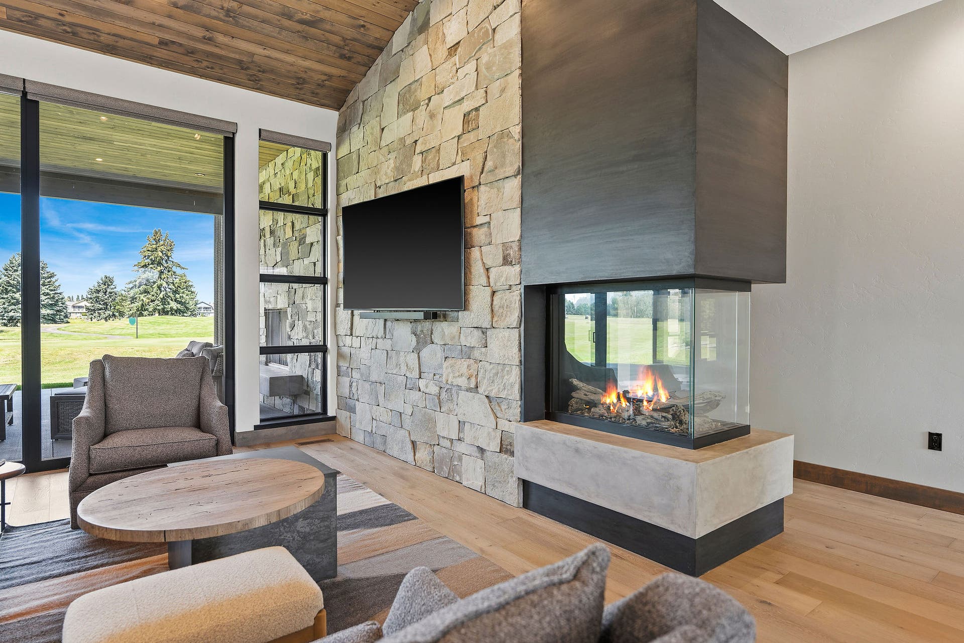 1283 Lake Pointe Drive, Bigfork, MT 59911 Natural gas fireplace, see through on 3 sides, Italian plaster hearth