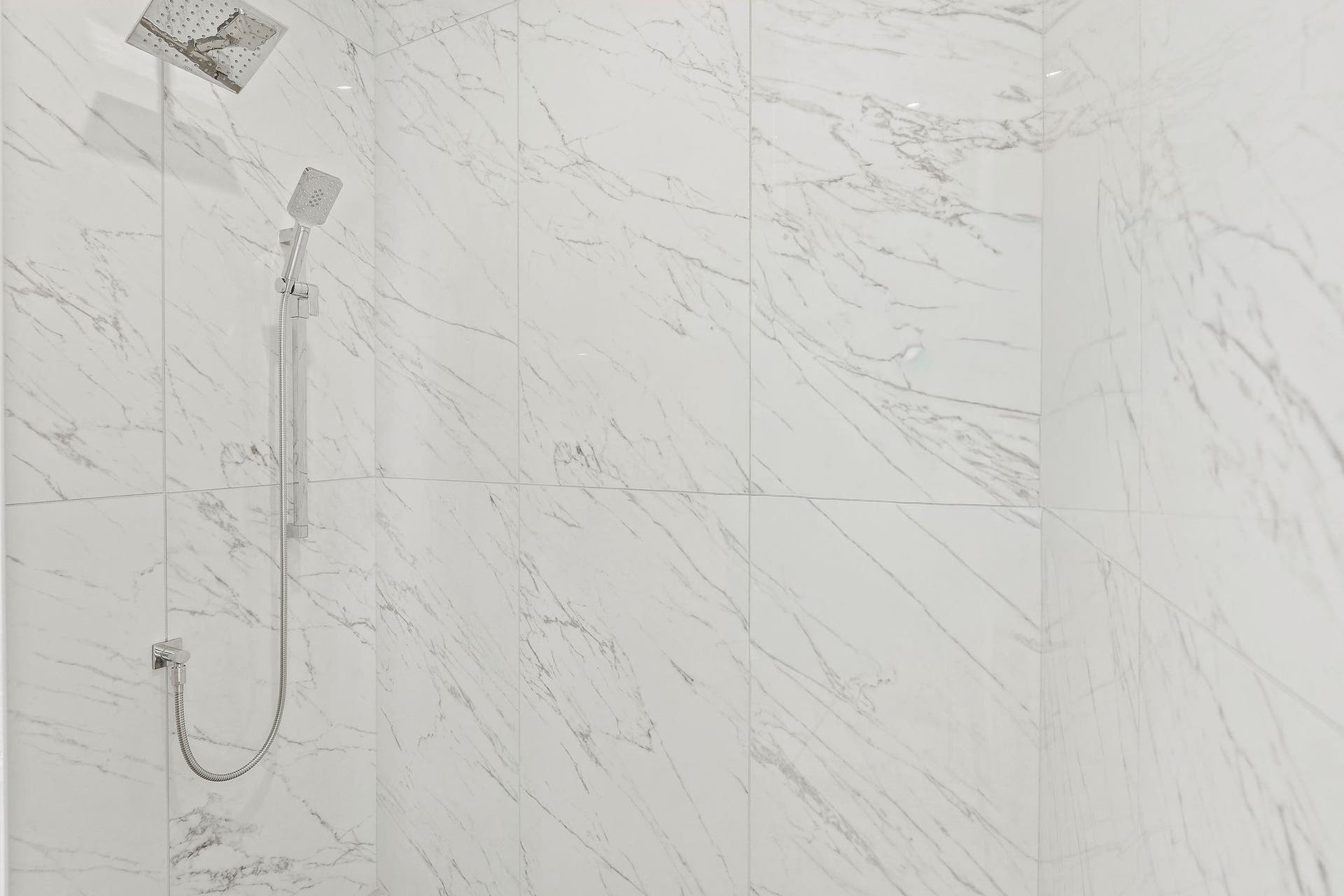 1283 Lake Pointe Drive, Bigfork, MT 59911 Guest Bathroom #1 - Marble shower with dual shower heads