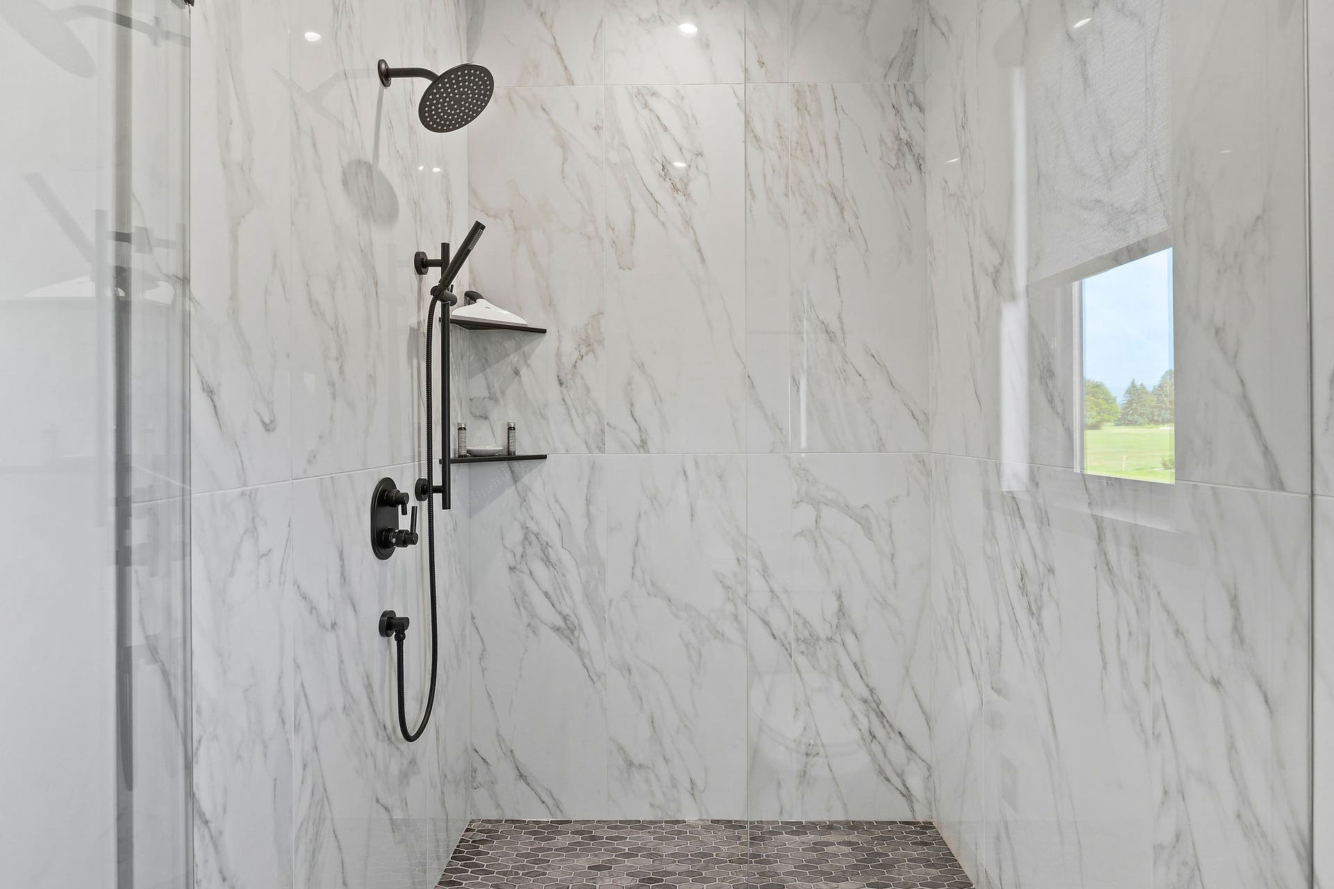 1283 Lake Pointe Drive, Bigfork, MT 59911 Guest Bathroom #2 - marble shower with dual shower heads