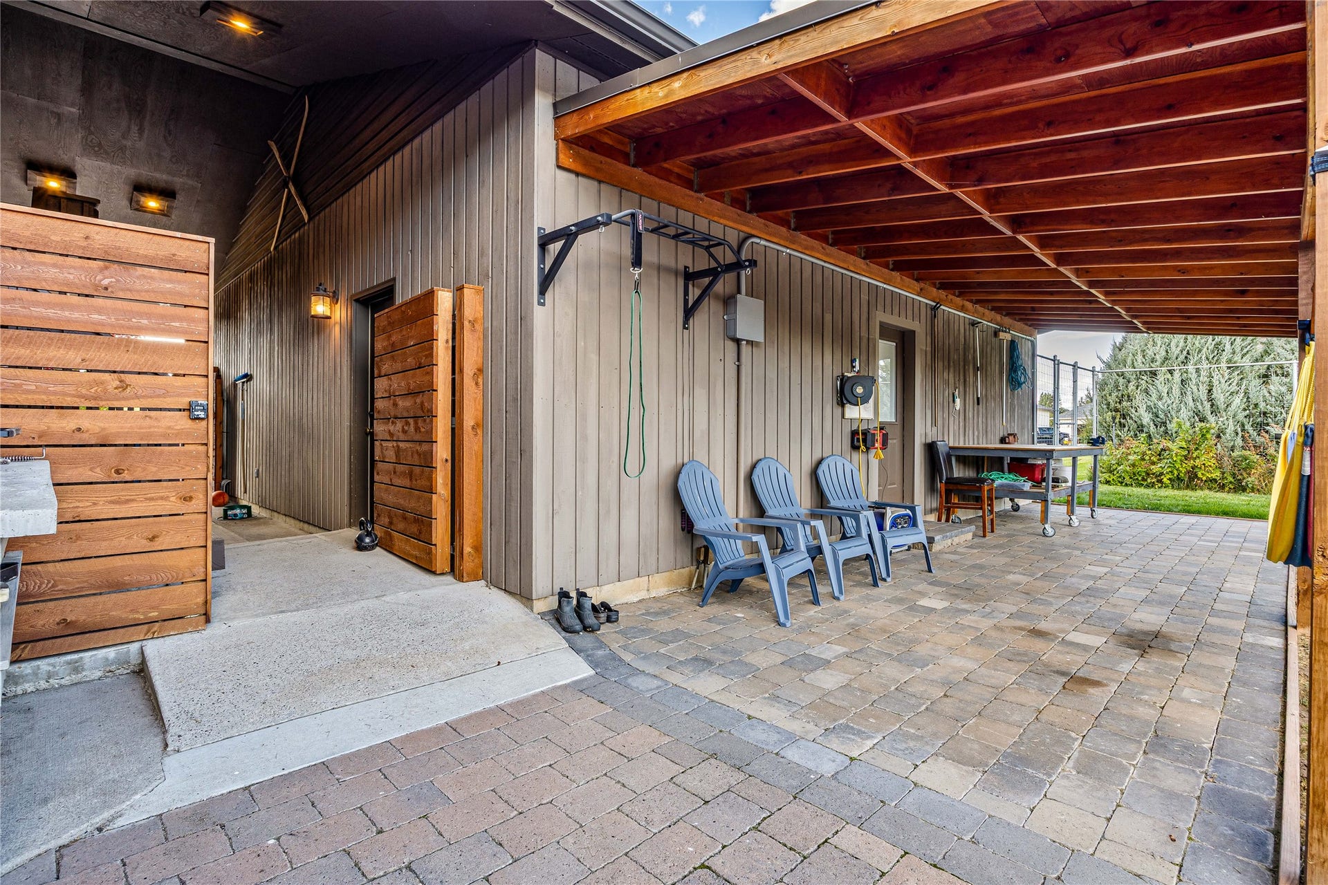 Breezeway though to back yard.  Covered patio off garage.