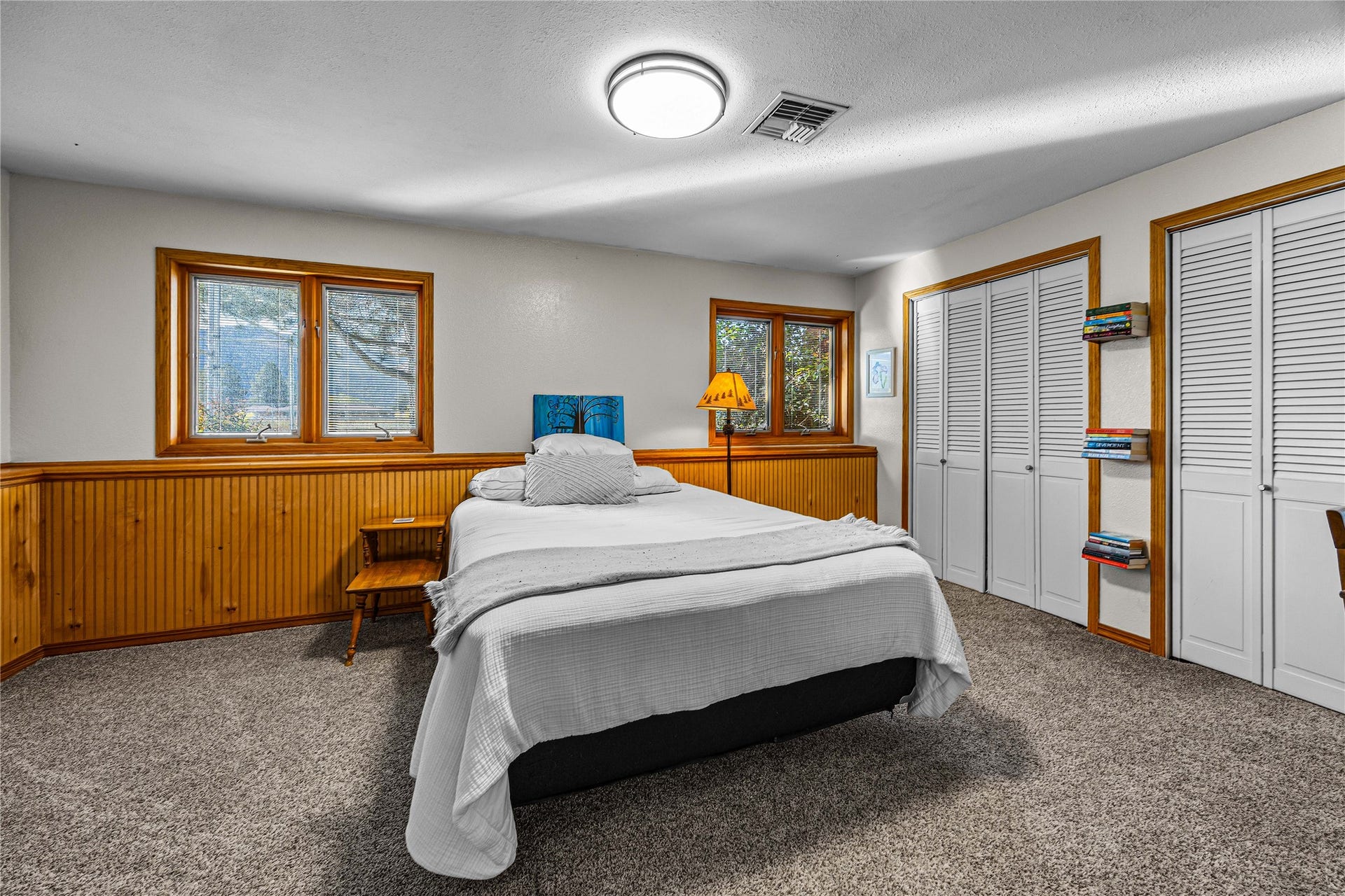 Bedroom or office with french doors in the lower level.
