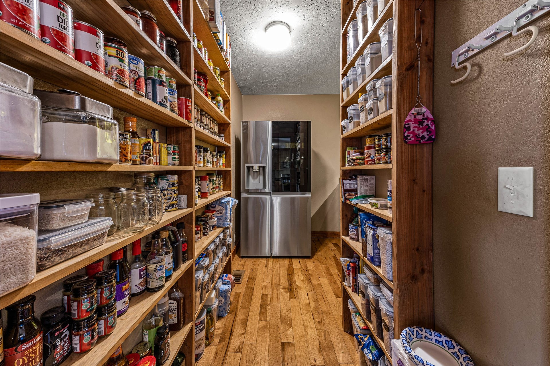 Walk-in/butler's  pantry with 2nd refrigerator