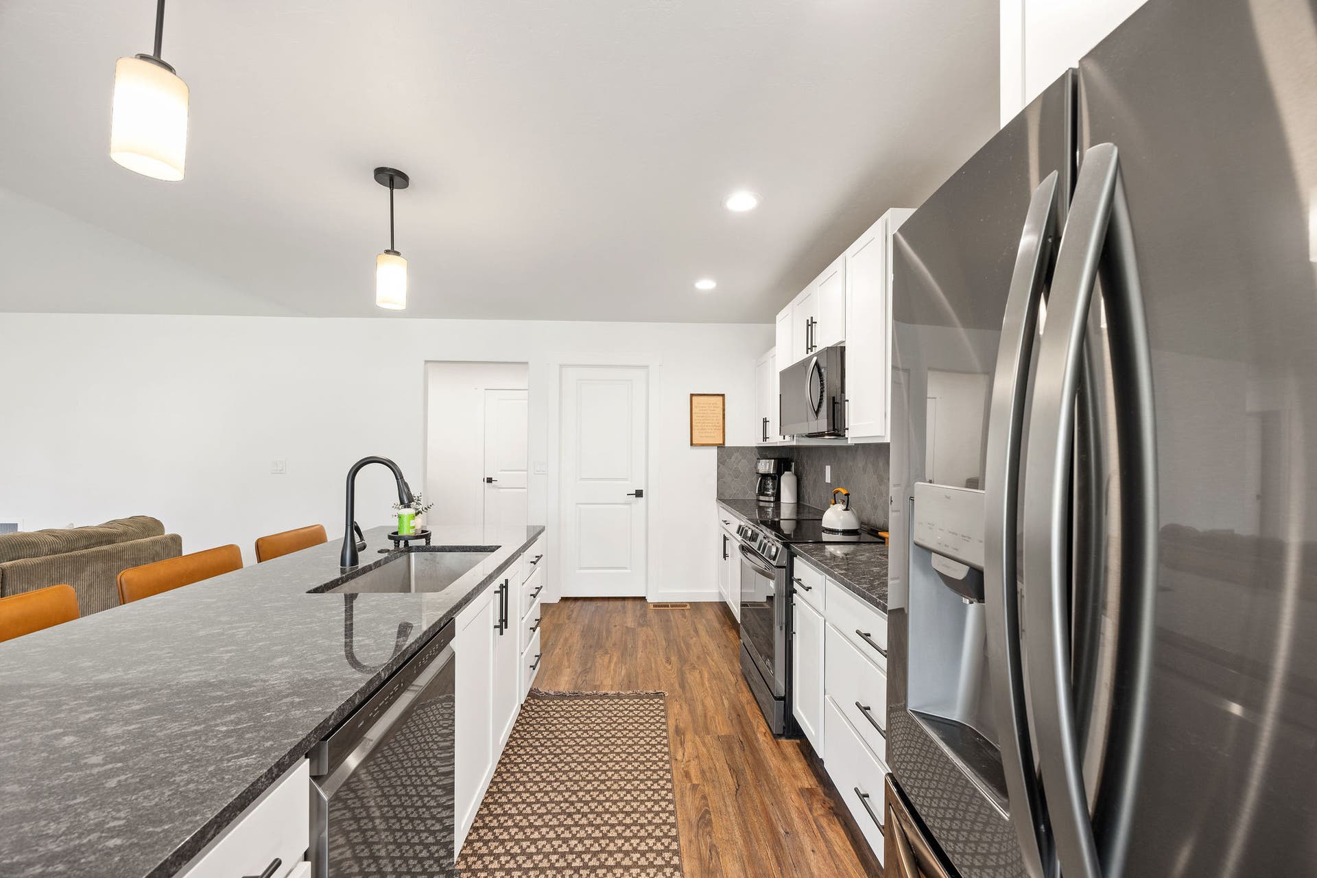 221 Stage Ridge Road, Bigfork, MT 59911 Large kitchen island and stainless-steel appliances