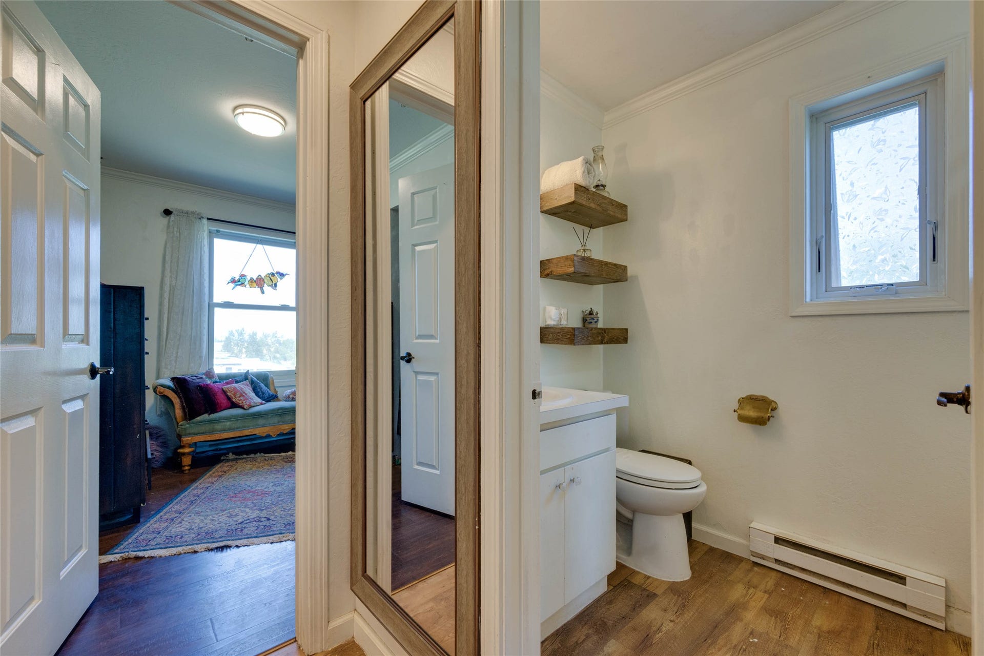 bathroom with 2nd bedroom on the left