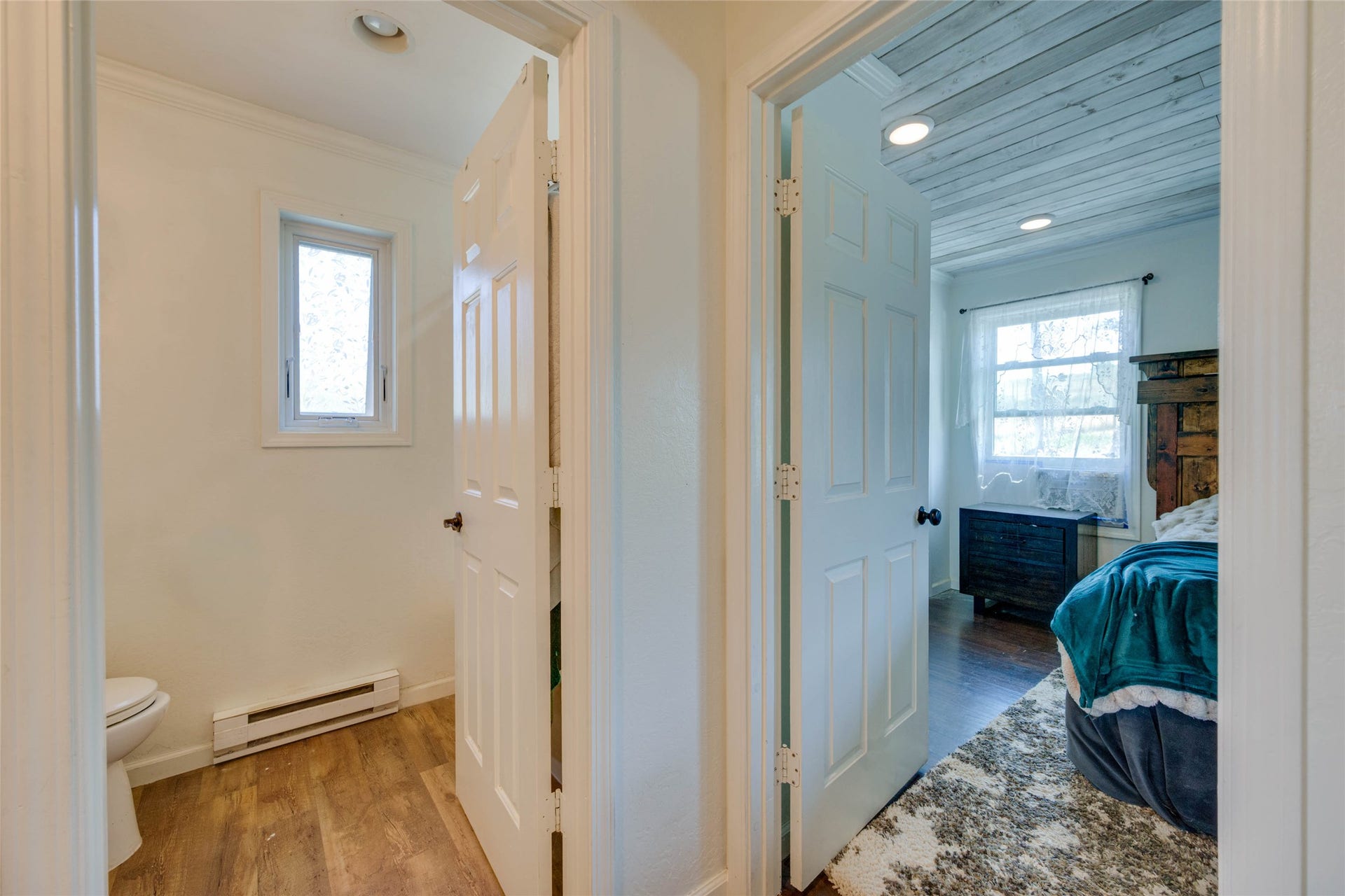 bathroom at the end of the hall with master on the right