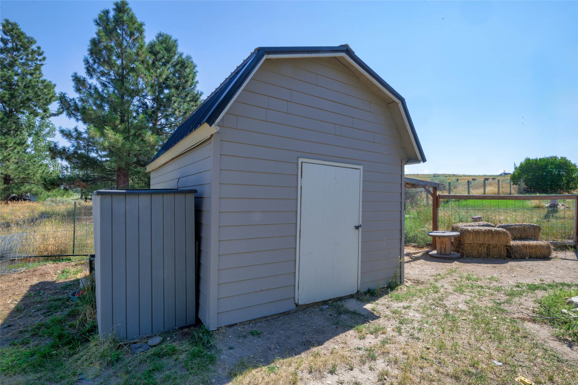 chicken coop with pig enclosure off back