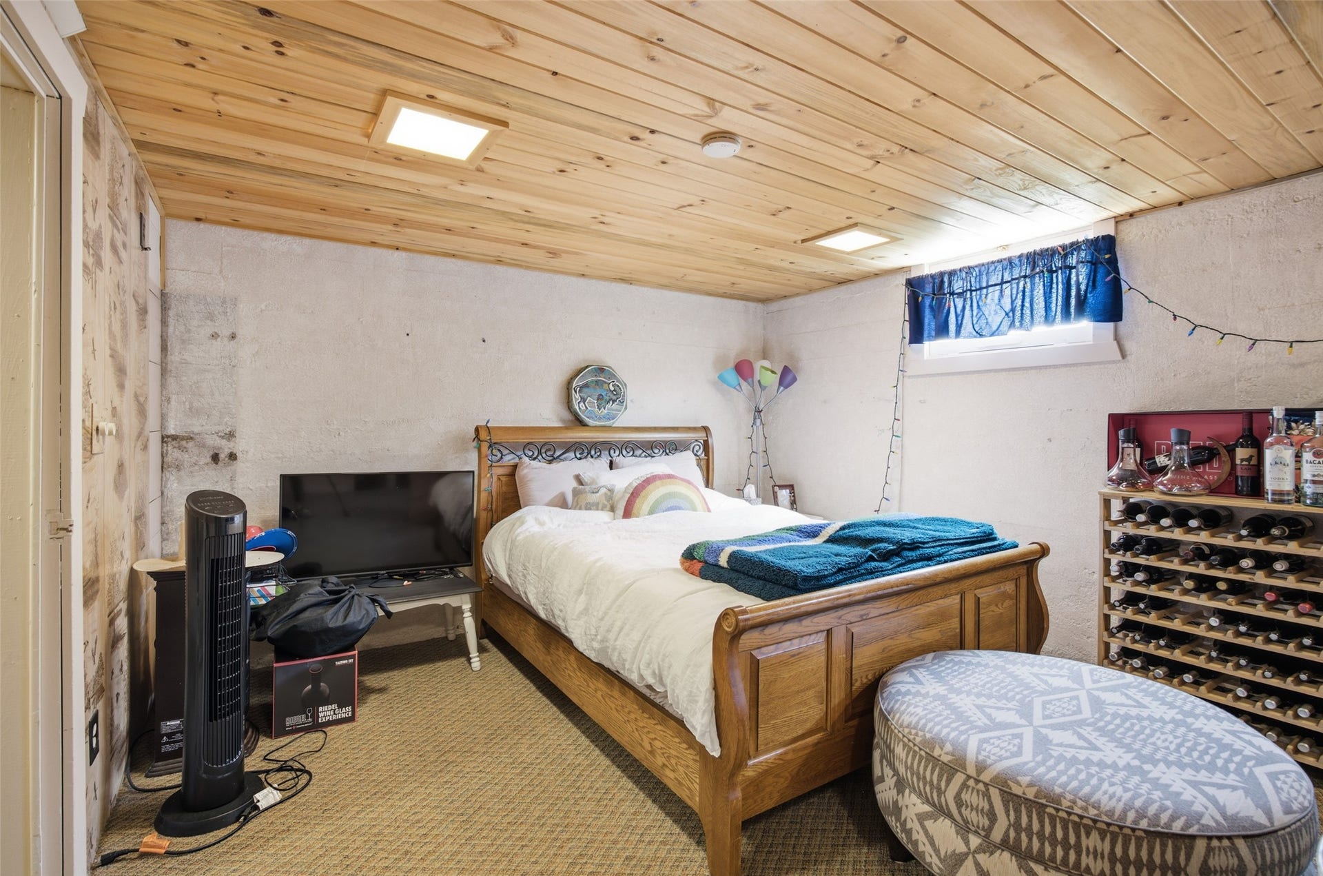 Wood-paneled ceiling with recessed lighting