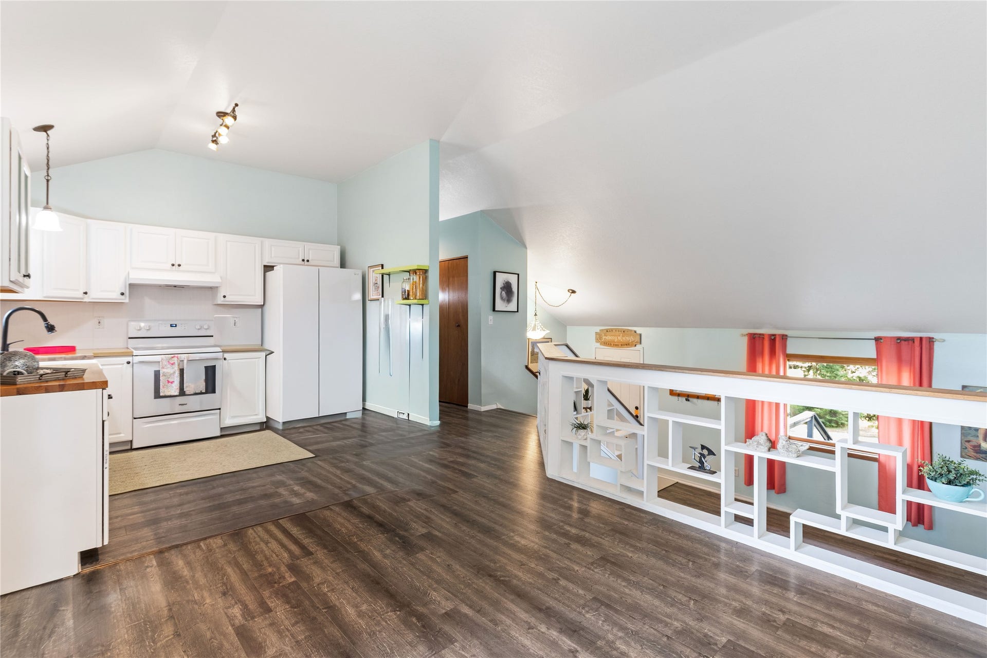 130 Alpine Drive, Bigfork, MT 59911 Open to below kitchen and dining keeps everyone connected